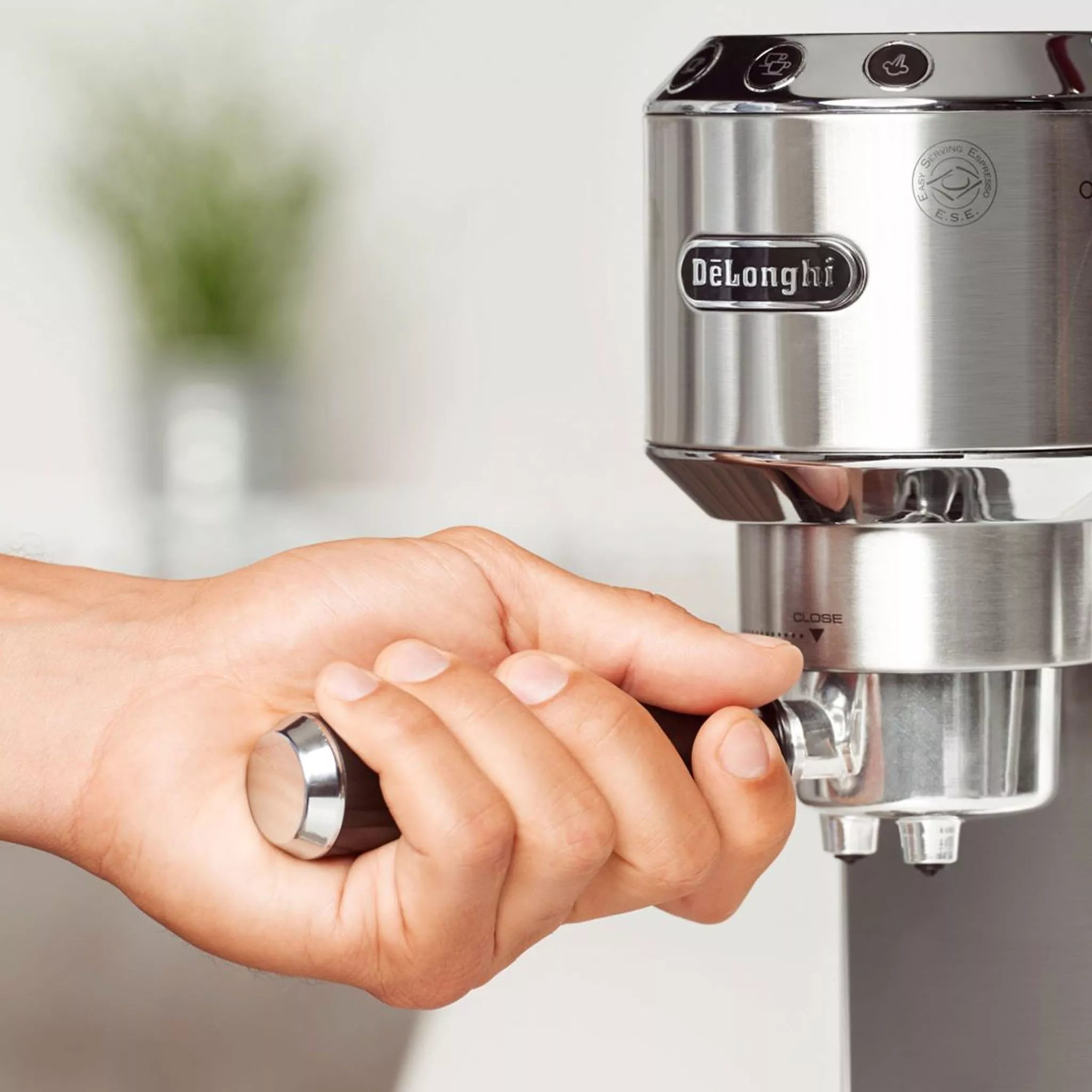 Portafilter being connected to a coffee machine