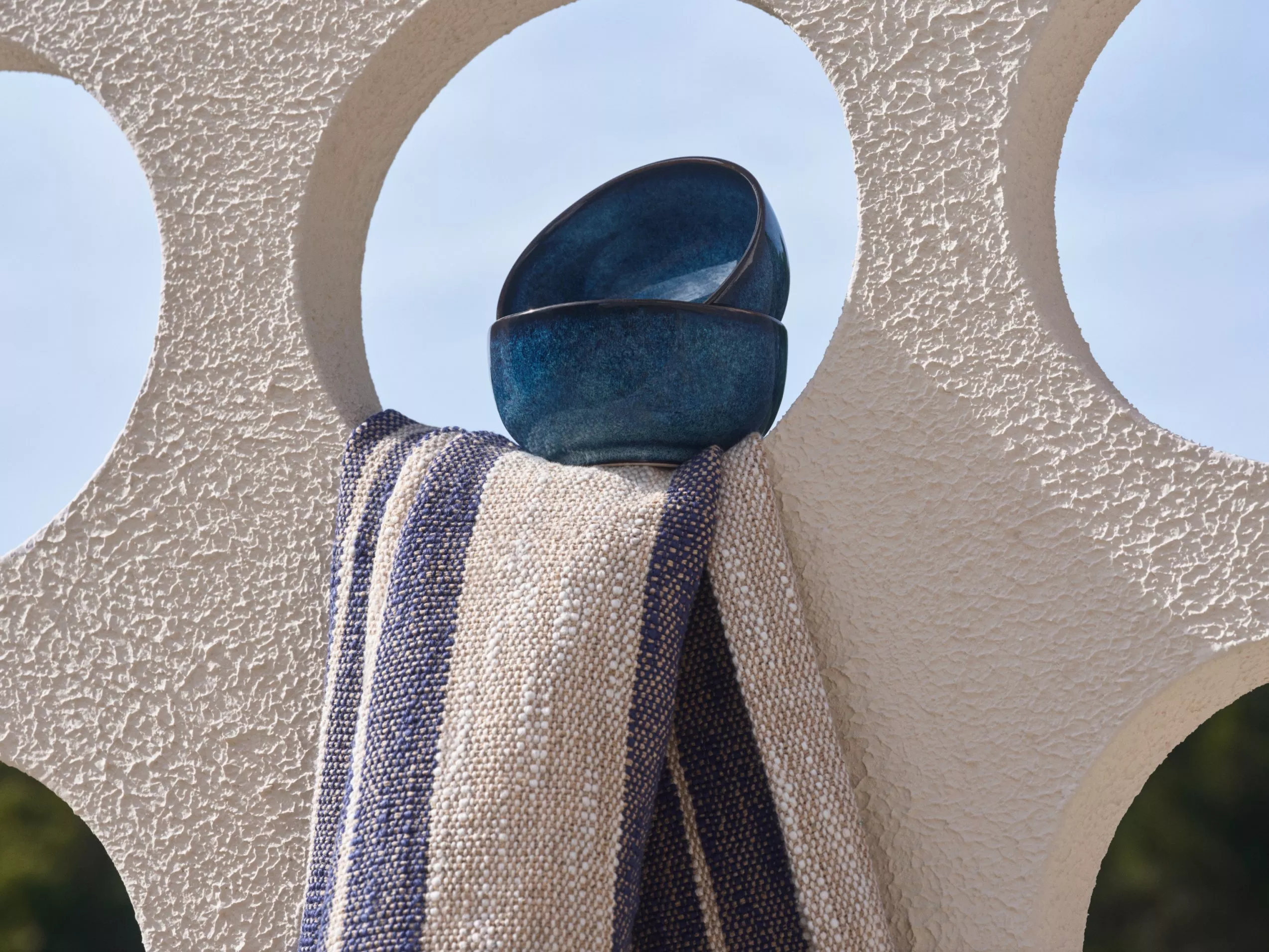 image of 2 bowls and a tea towel on a wall
