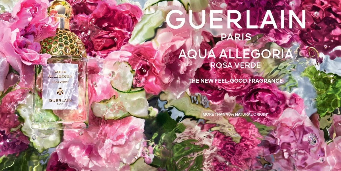 A banner showing a bright flower display showcasing a Guerlain product.