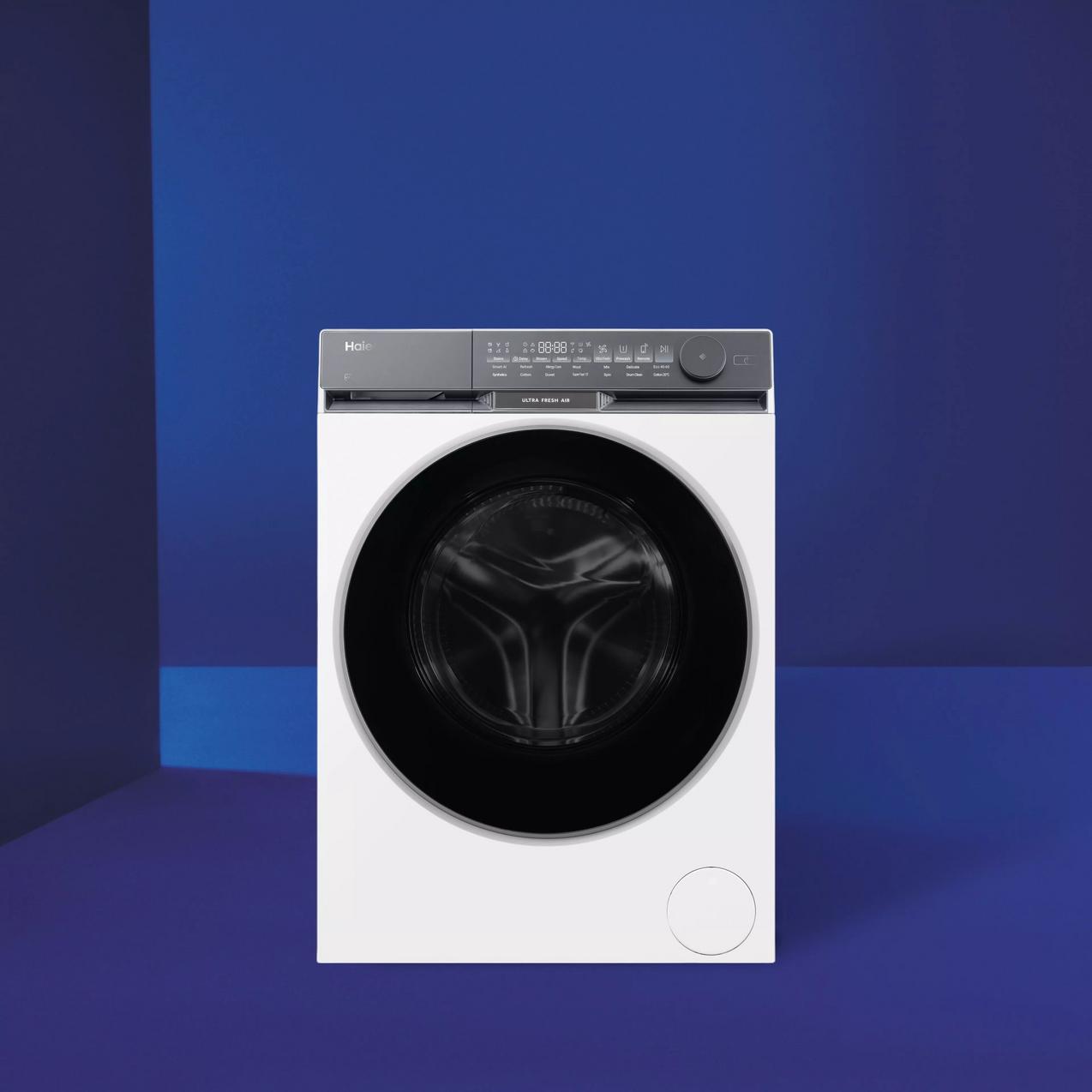 Front view of a white Bosch Serie 6 tumble dryer with a black rimmed glass door, digital display, and dial control, set against a solid blue background.