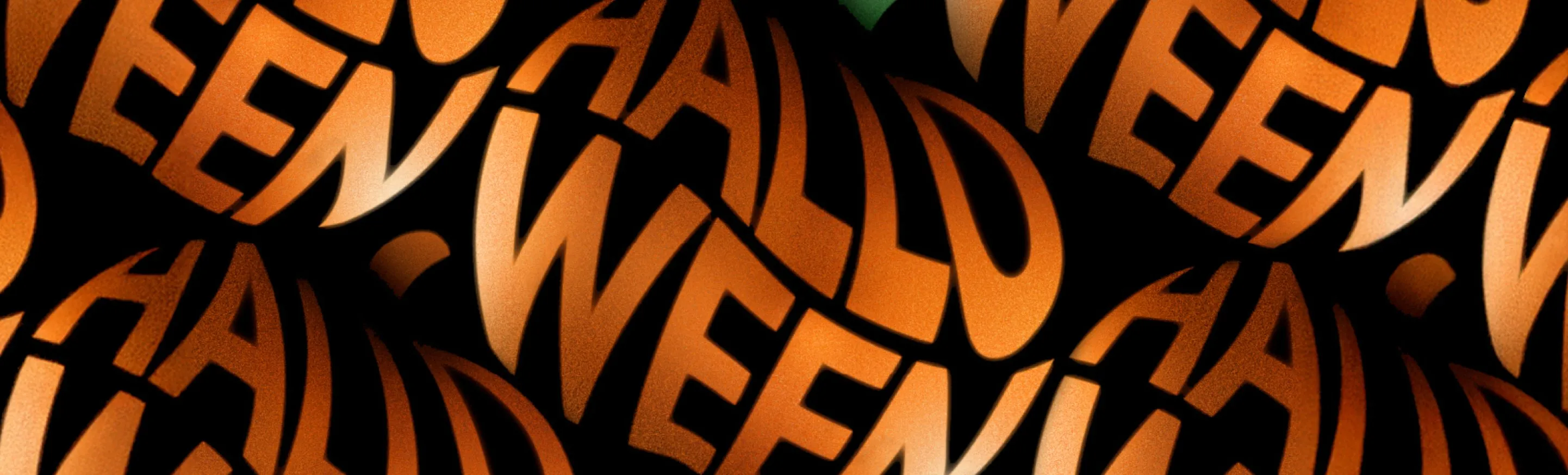 Close-up of orange Halloween typography pattern on black background, repeating “WEEN” and “HALLO” text.
