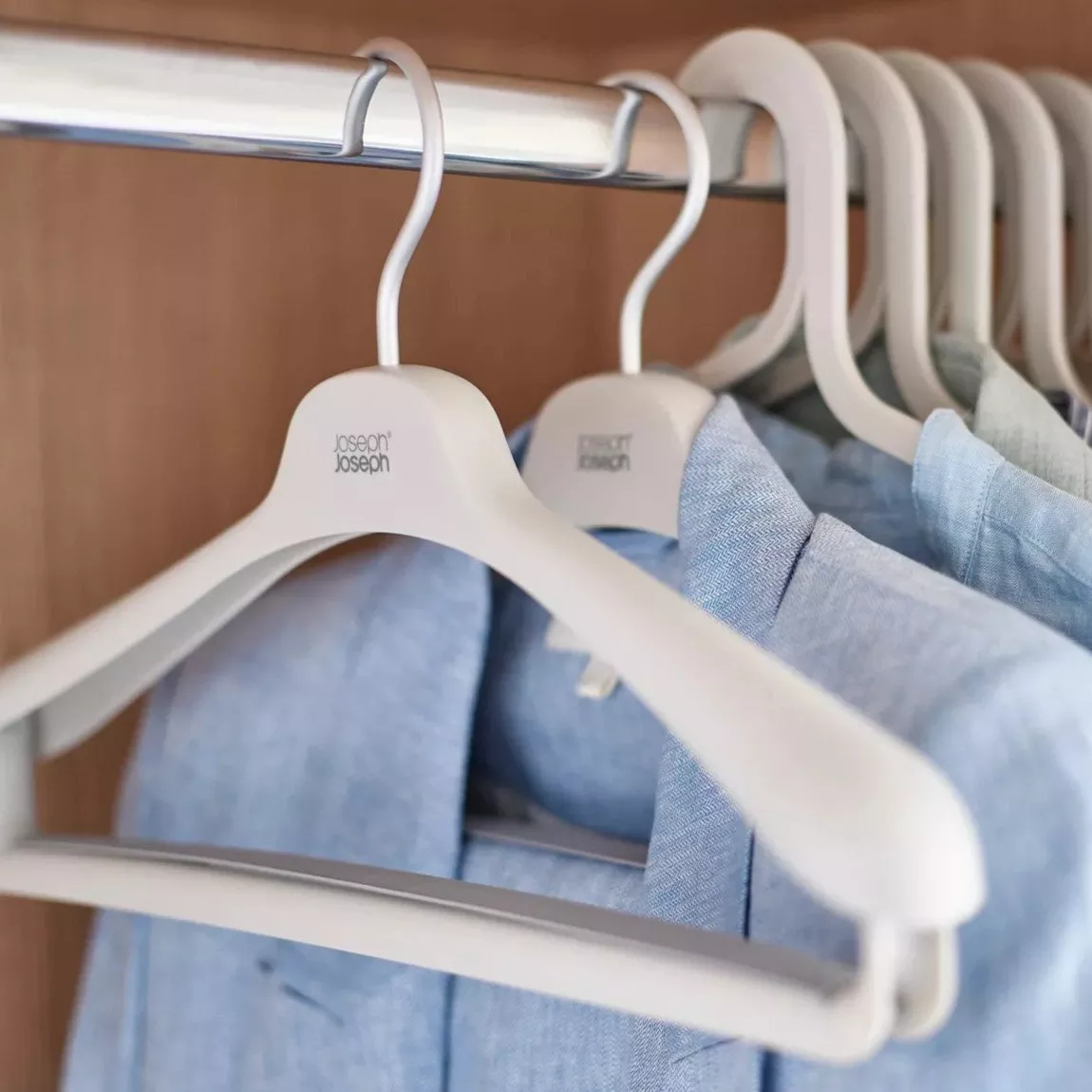 Clothes hanger and some blue shirts