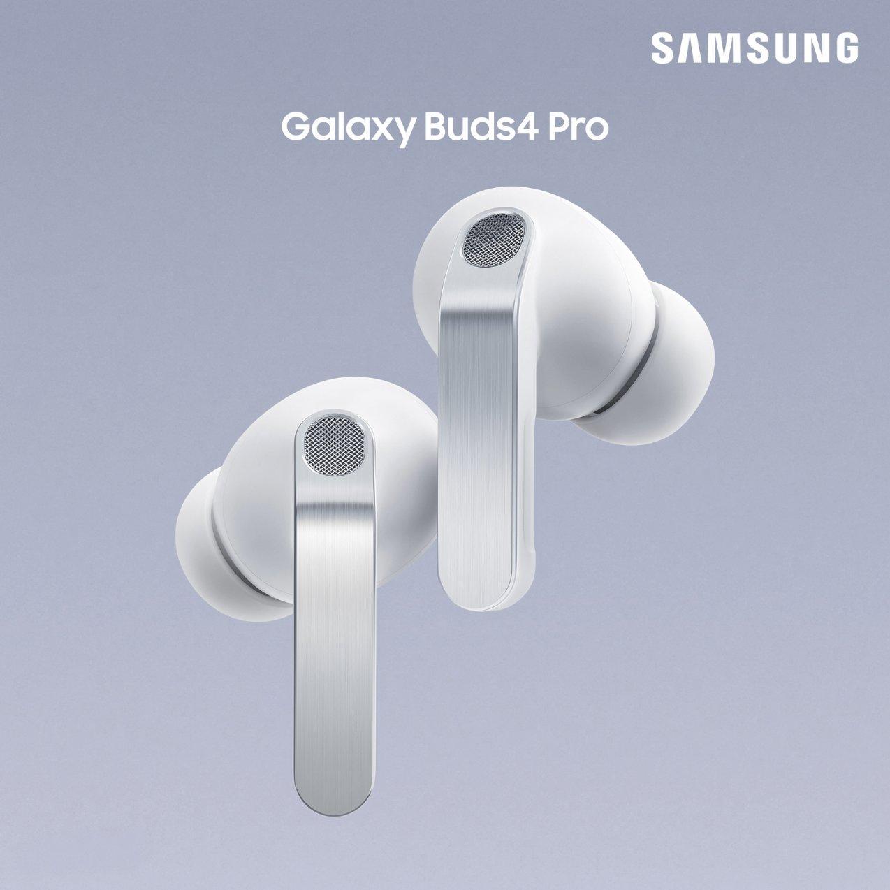 Pair of white Samsung Galaxy Buds4 Pro wireless earbuds with silver metallic stems on a light grey background.