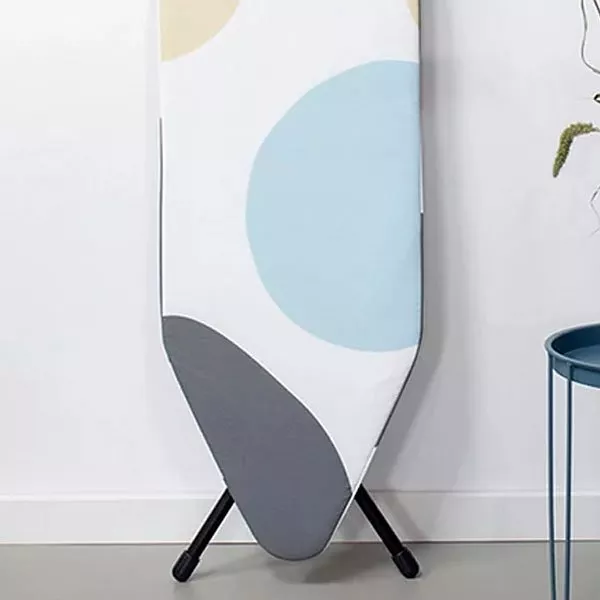 White, blue and grey patterned ironing board