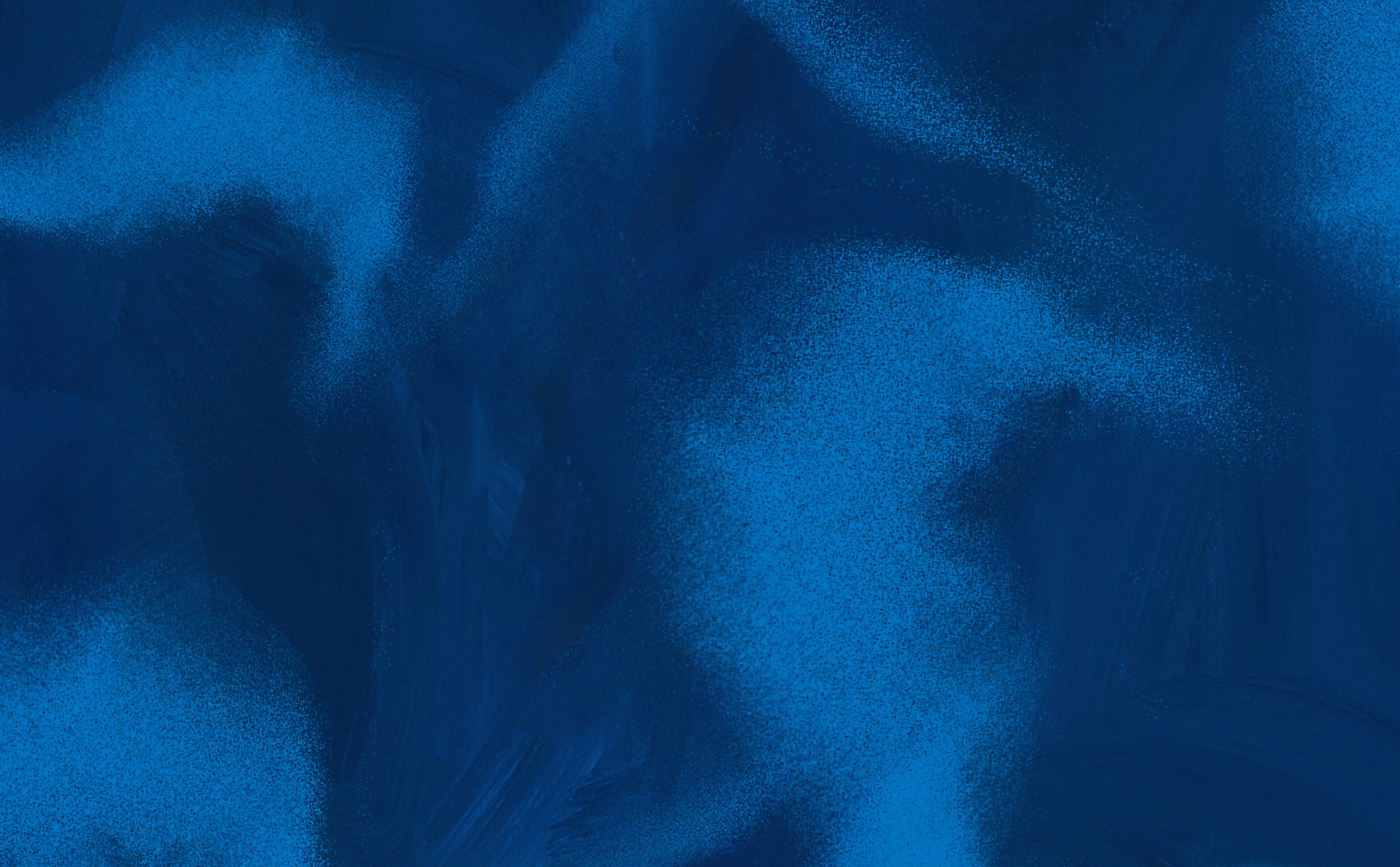 Abstract deep blue gradient background with textured brush stroke pattern