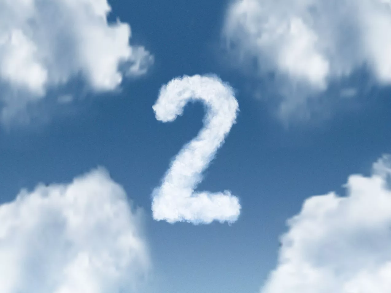Number 2 formed from white clouds in a blue sky, conceptual weather background for countdown and forecasting