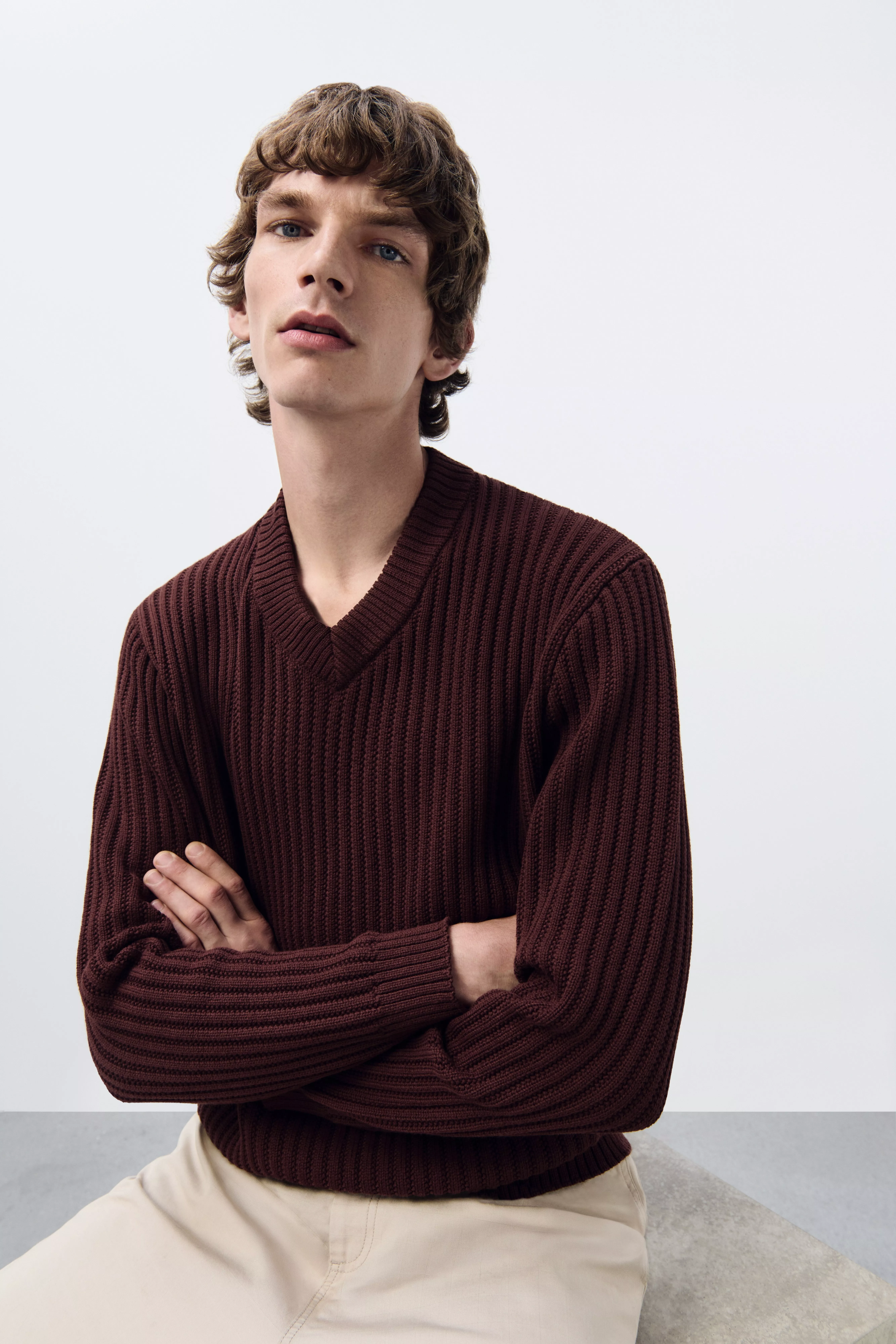 man wearing brown ribber jumper