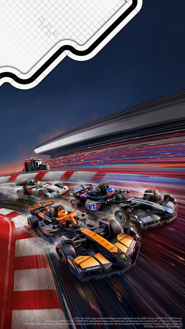 LEGO Speed Champions F1 race cars drifting on wet track with safety car and grandstand in the background