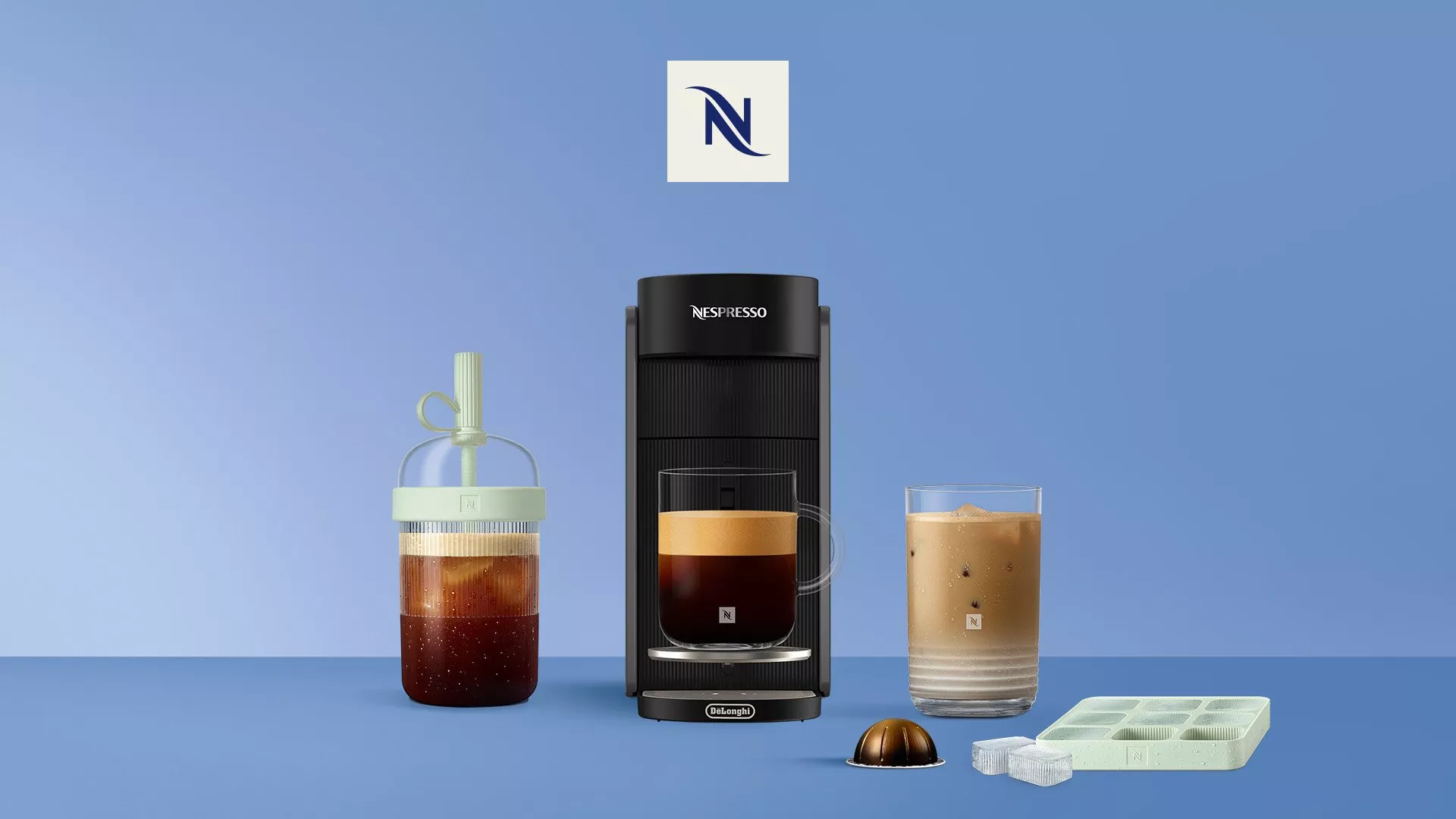 Nespresso coffee machine with iced coffee drinks, ice tray and capsule, on blue background product display