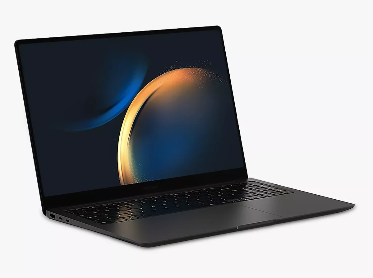 Sleek black laptop with vibrant screen displaying abstract blue and orange swirls on a white background.