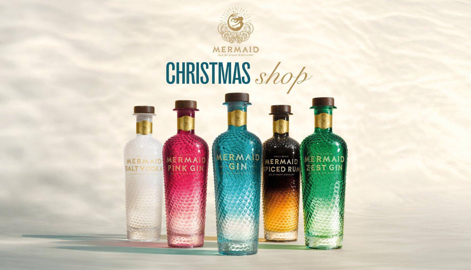 Mermaid Gin Christmas Shop hero with 5 bottles of different mermaid gins in a line