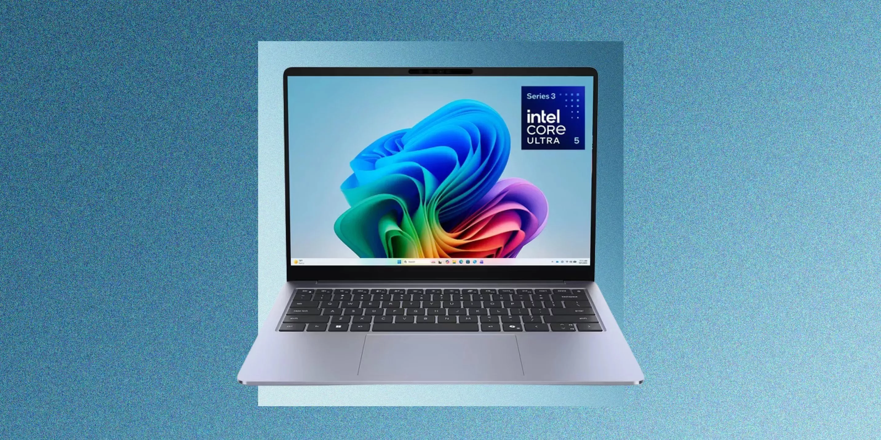 An open laptop displayed against a textured blue backdrop, showcasing the Windows 11 desktop wallpaper and an "intel CORE ULTRA 5 Series 3" badge in the top right corner of the screen.