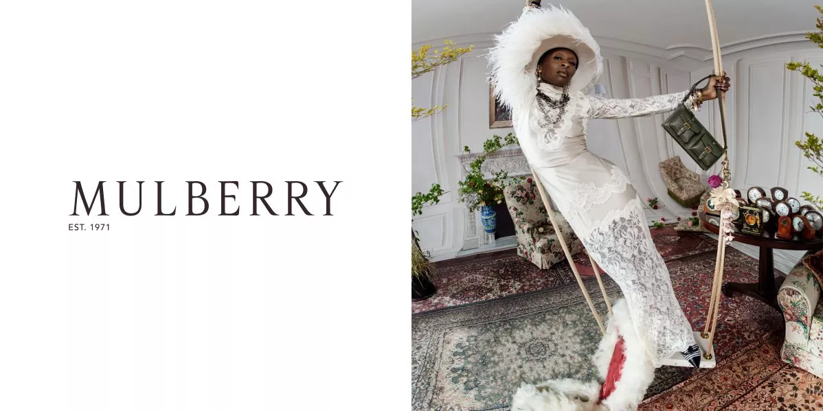 This is a banner for Mulberry with a model holding a Mulberry bag