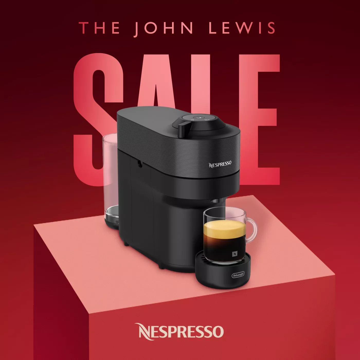 John Lewis sale banner featuring a Nespresso coffee machine and espresso cup on a red display block