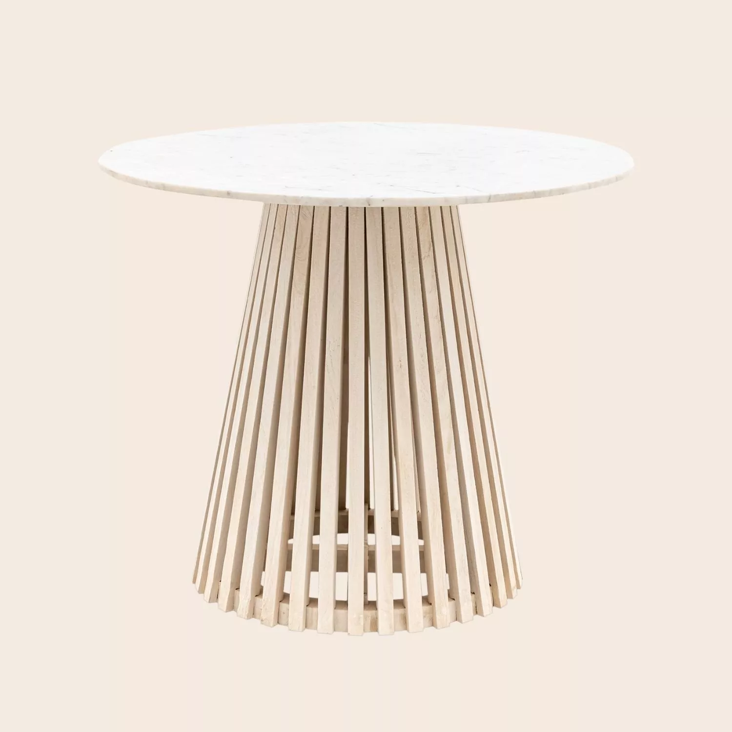 Round white marble dining table with slatted wooden pedestal base, modern Scandinavian style furniture on plain backdrop