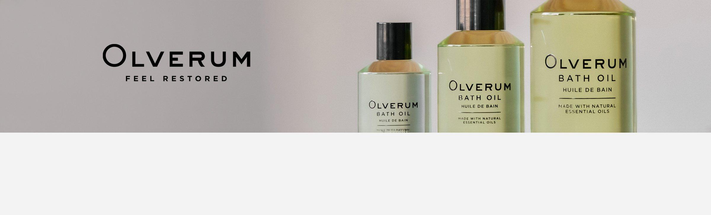 close up of Olverum products in bottles on a white background