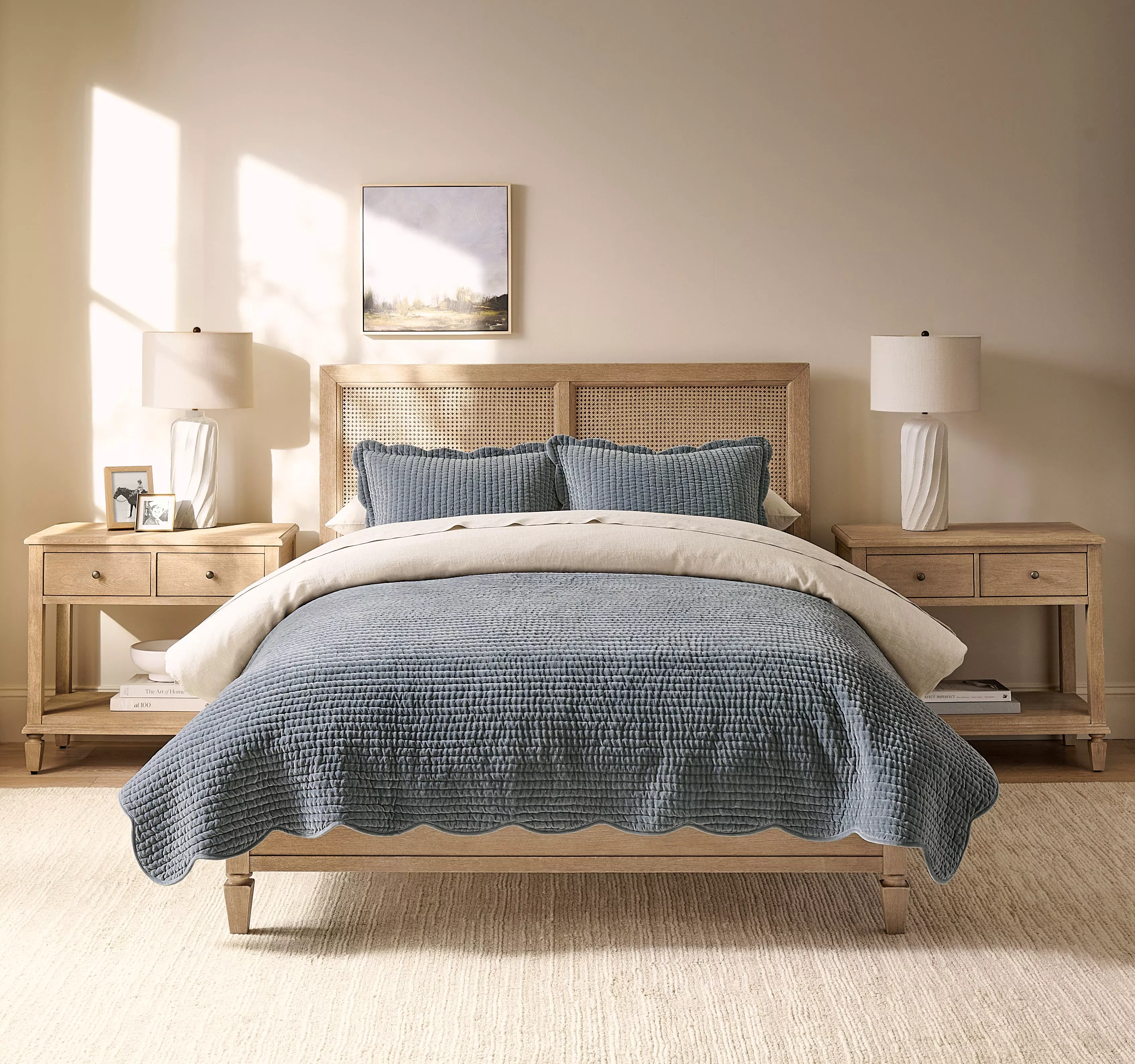 bed with grey duvet cover and bedspread