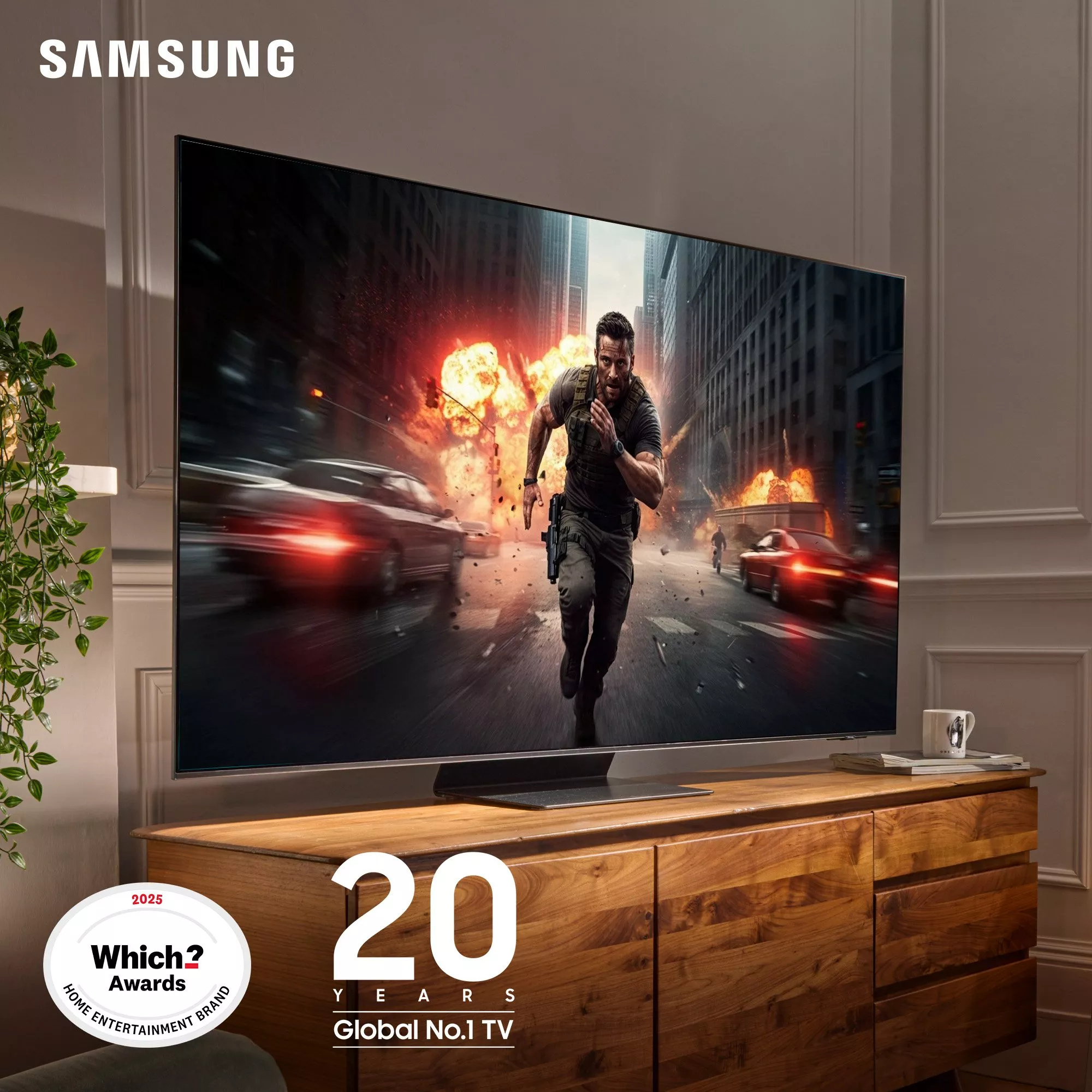 A Samsung smart TV displaying an action movie scene sits on a wooden sideboard, with a "2025 Which? Award" featured