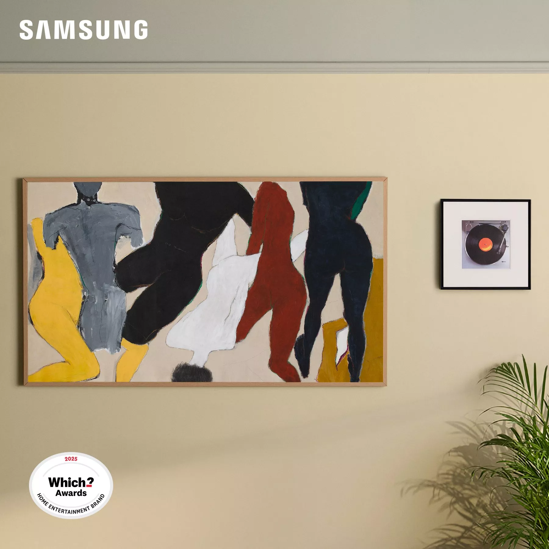 Samsung TV with colourful screen and a music frame next to it
