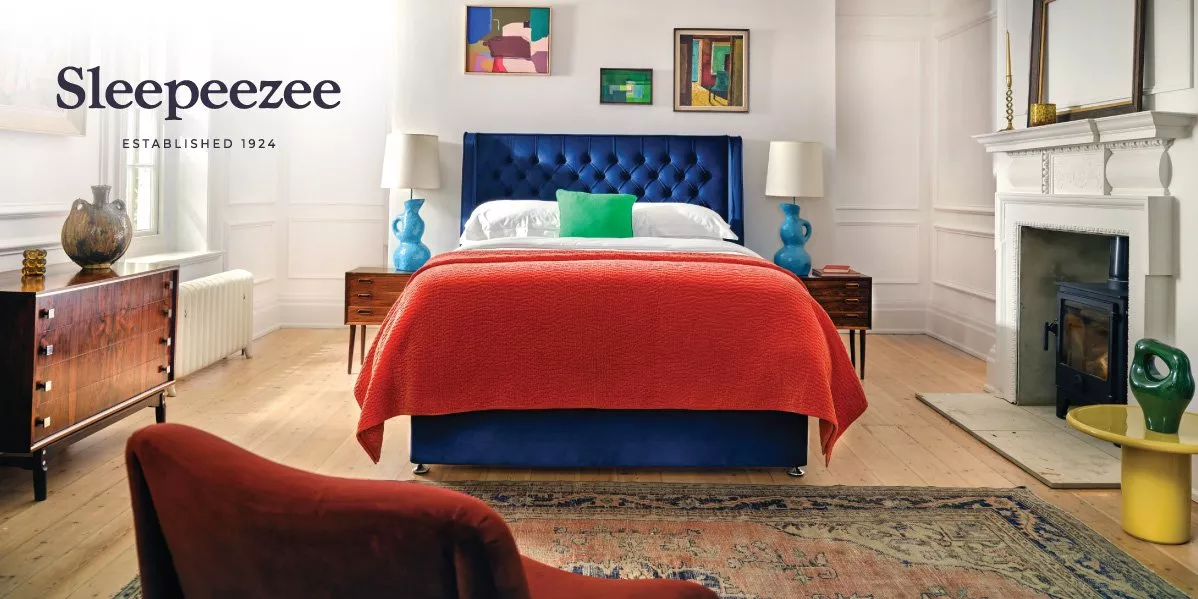 This is a banner for Sleepeezee showing a bed.