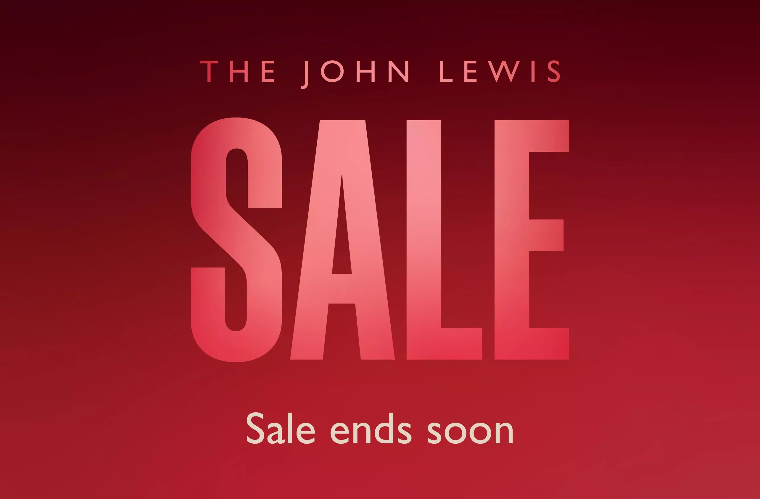 'The John Lewis sale' written in red text on a red background