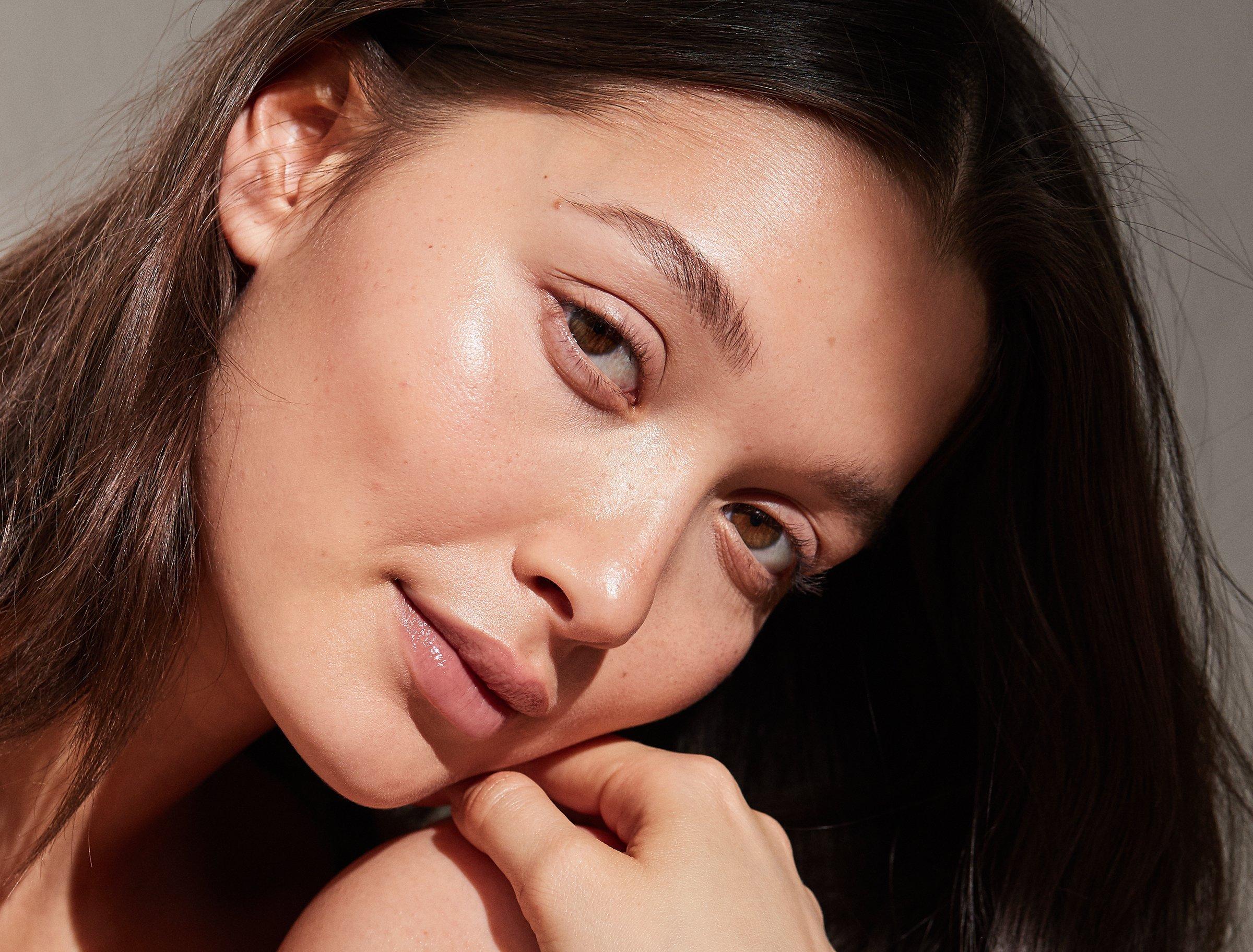 Woman with fresh moisturised skin