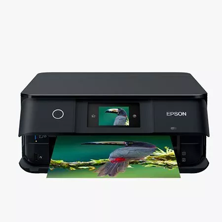Black printer printing a colourful image