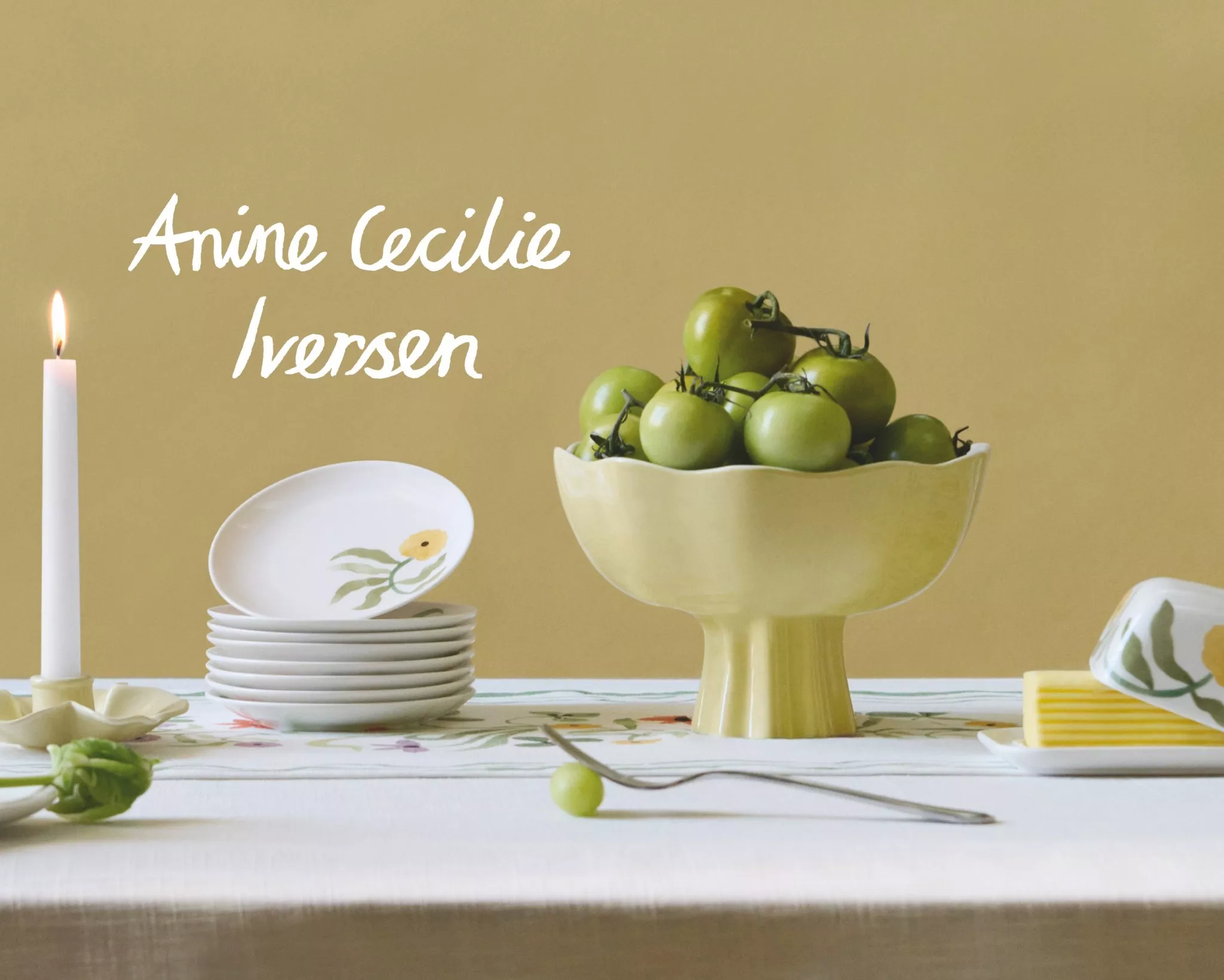 Homeware from the John Lewis x Anine Cecilie Iversen collaboration set on a table against a yellow background