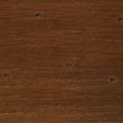 Dark brown wooden plank texture background with visible grain and small nail holes, rustic timber surface close-up
