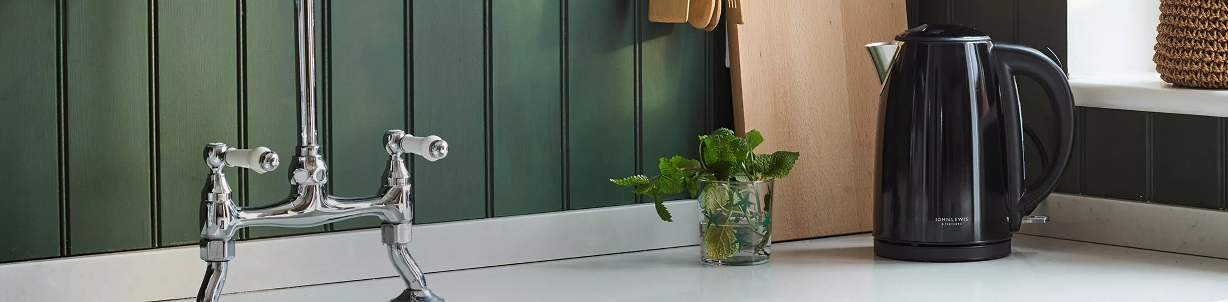 Black kettle on kitchen counter