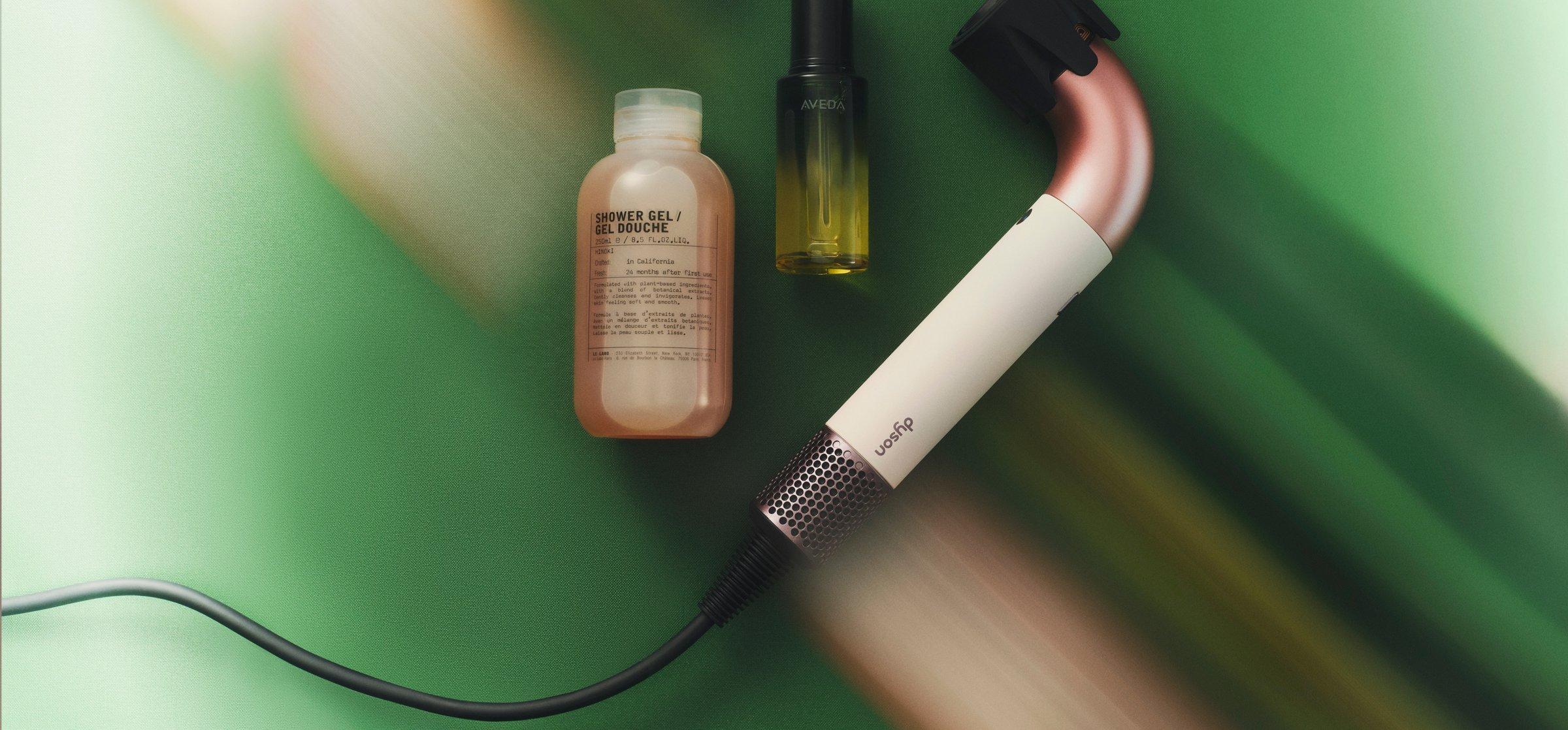 a Dyson product on a green background