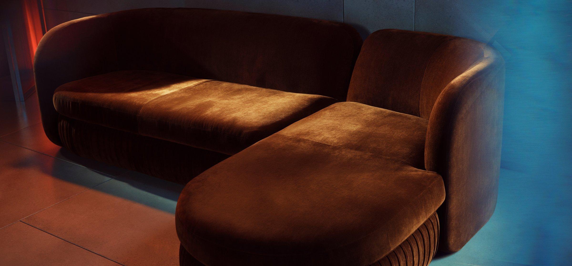 a brown suede sofa