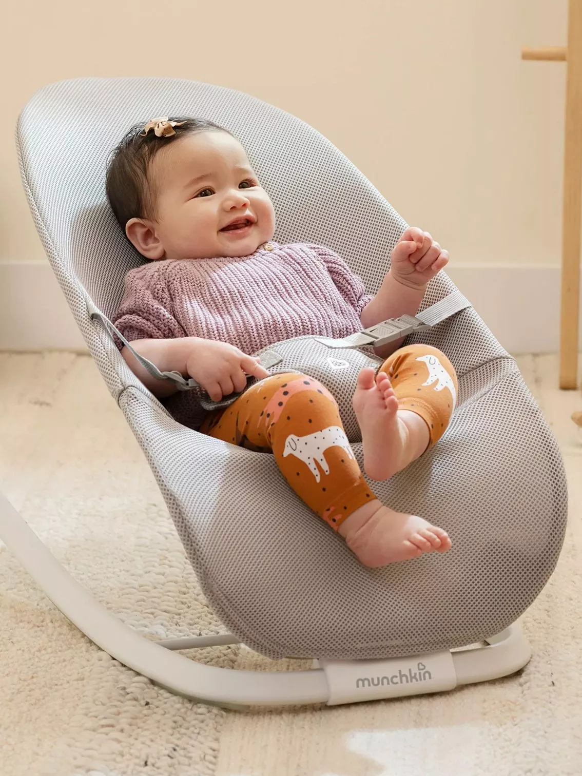 baby in rocker seat