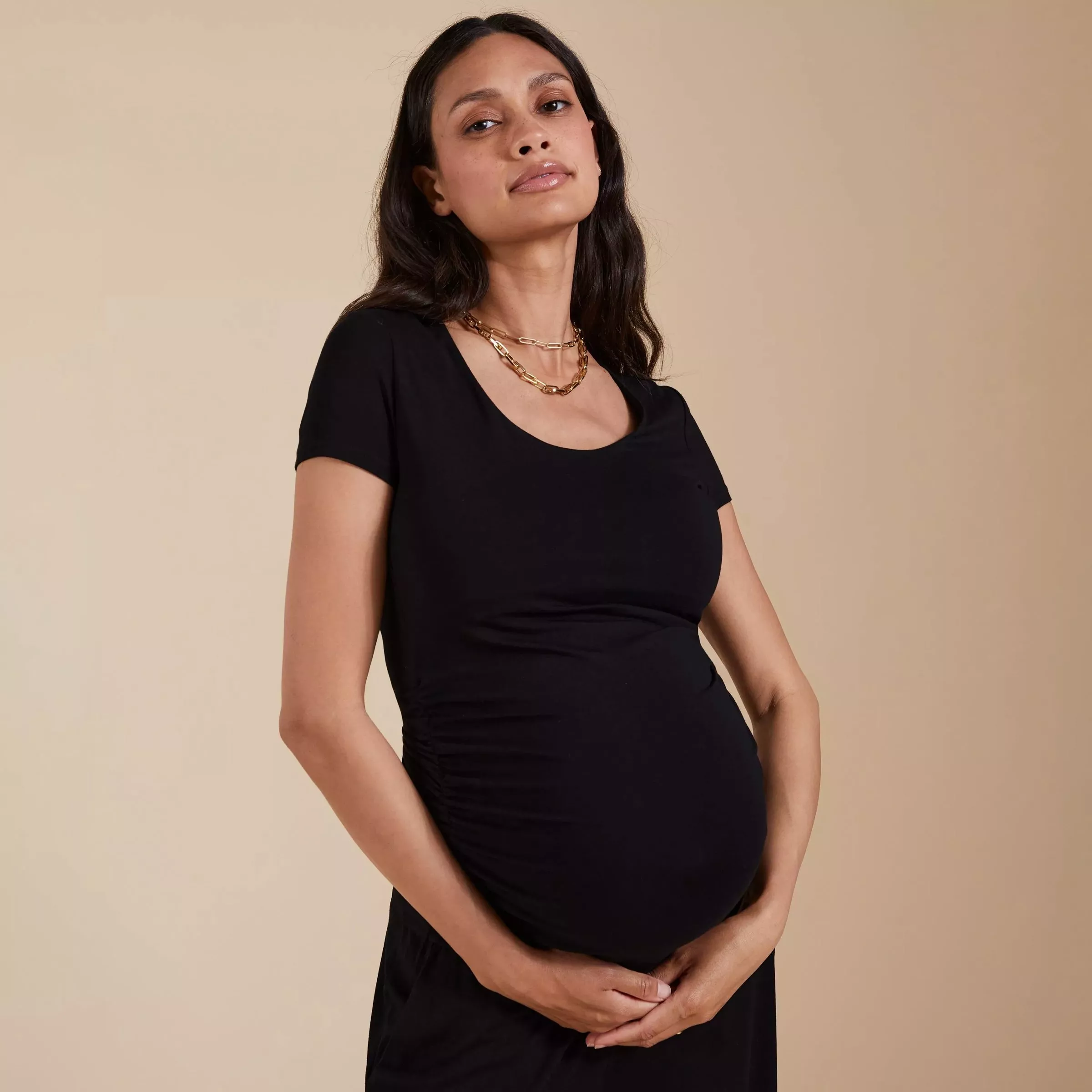 pregnant woman in black dress