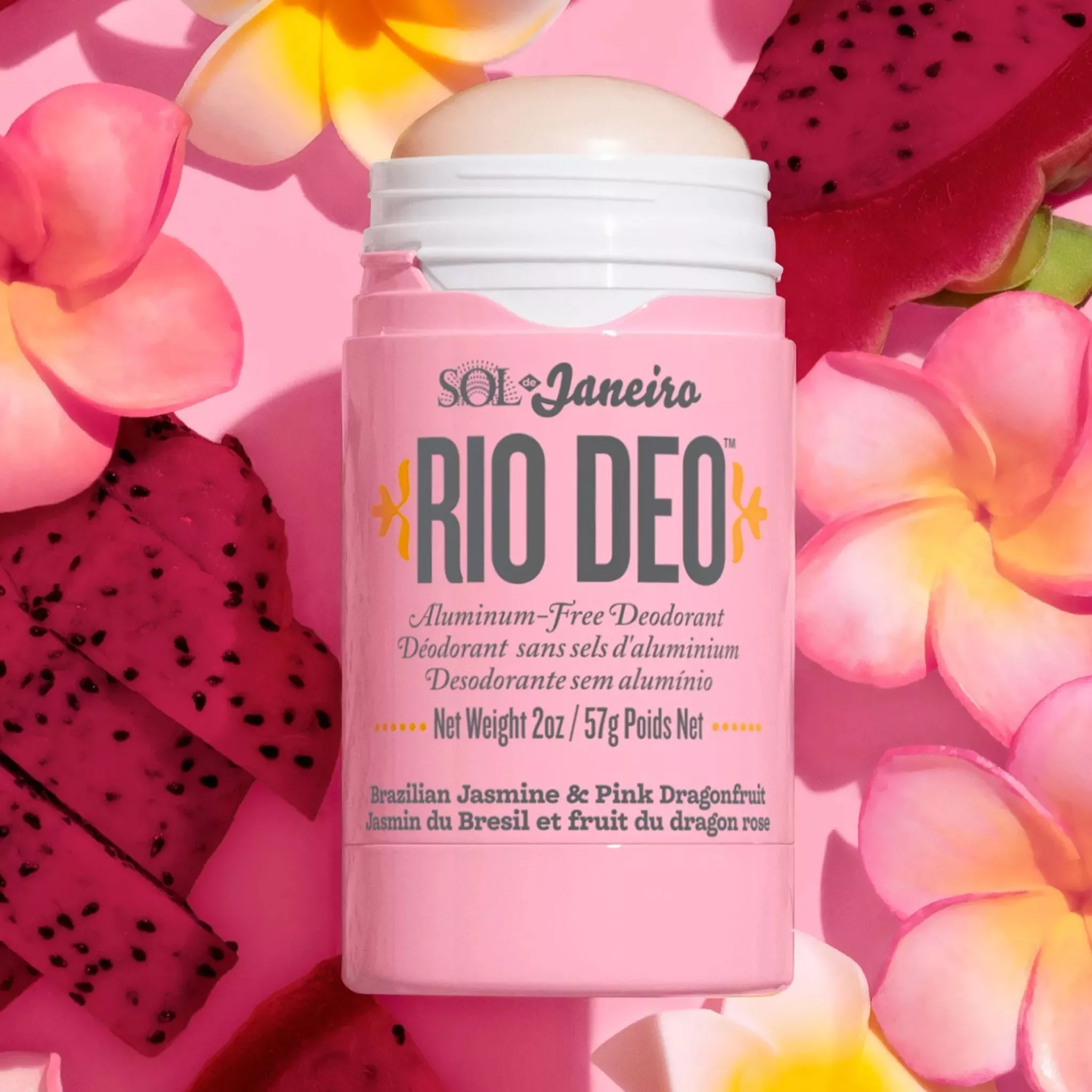 deodorant on pink flower and fruit background