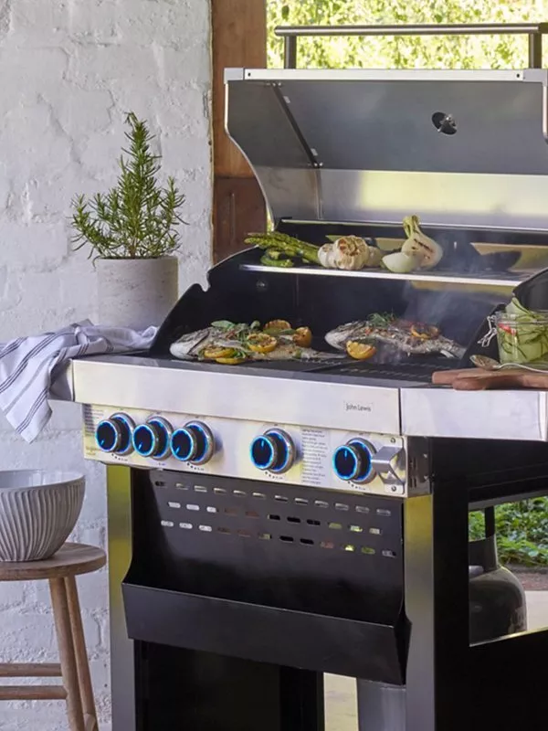 Barbecue with food cooking on it