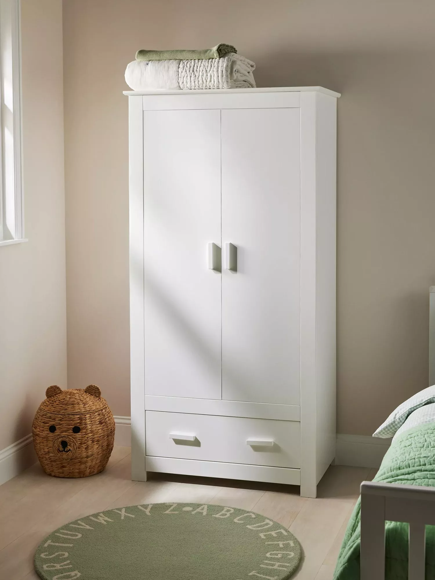 white wardrobe in children's bedroom