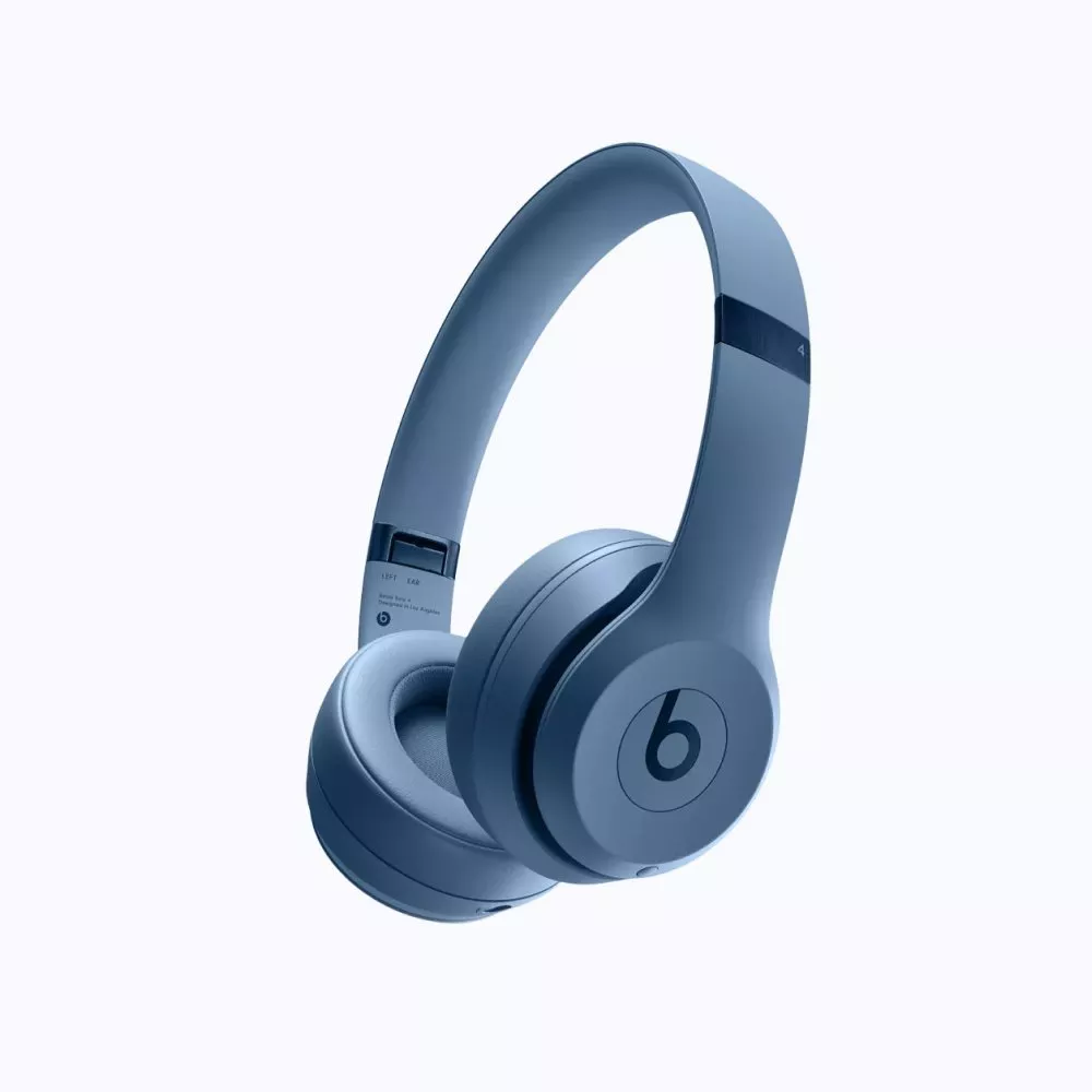 Blue Beats wireless over-ear headphones with cushioned earcups, studio-style headband, on white background