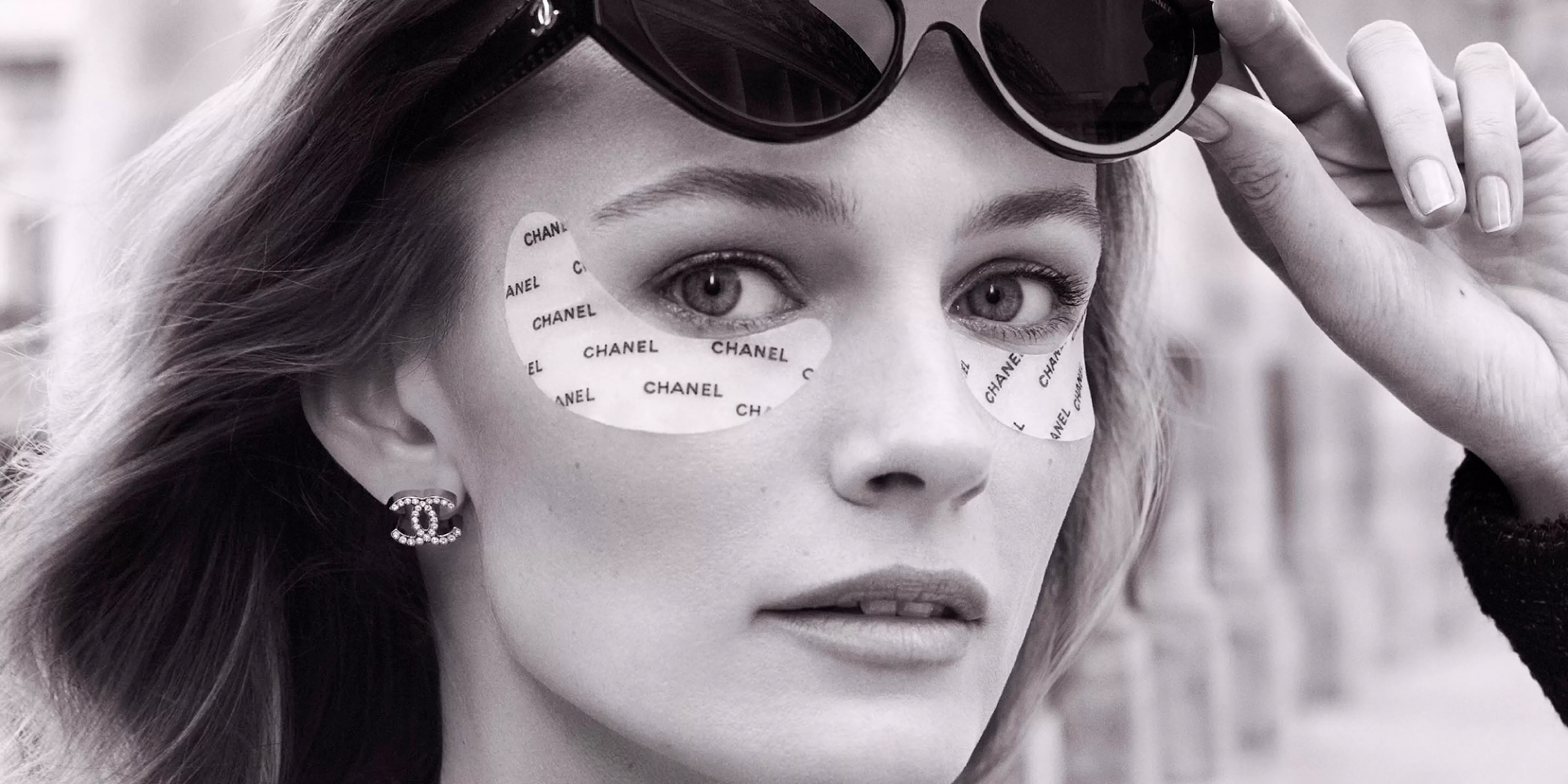 Model wearing Chanel beauty eye patches 