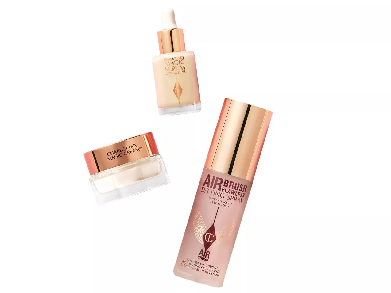 Luxury skincare and beauty products including serum, cream, and setting spray with elegant rose gold packaging.