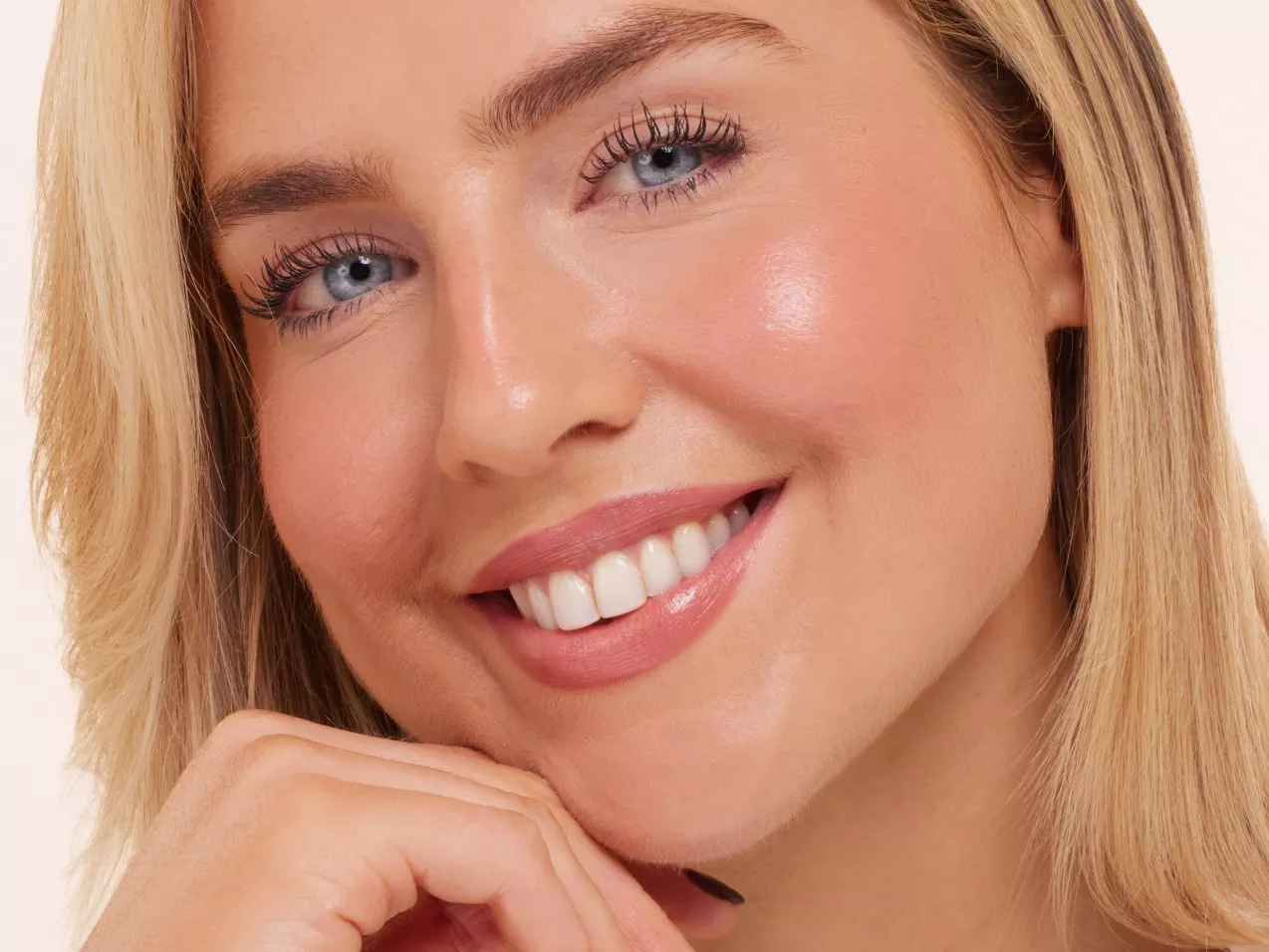 A headshot of makeup artist Aimee Connolly