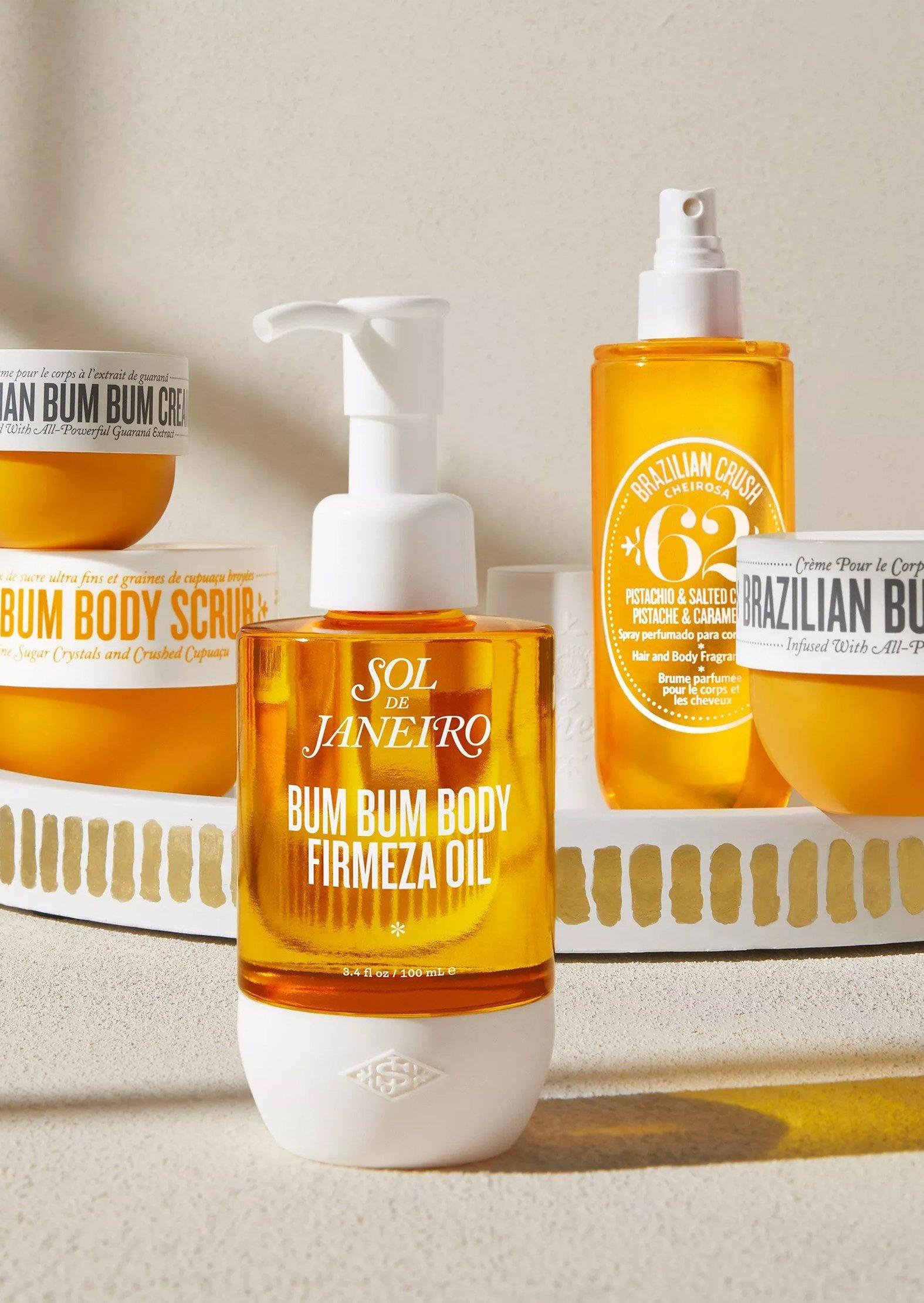 various Sol de Janeiro products on a cream table