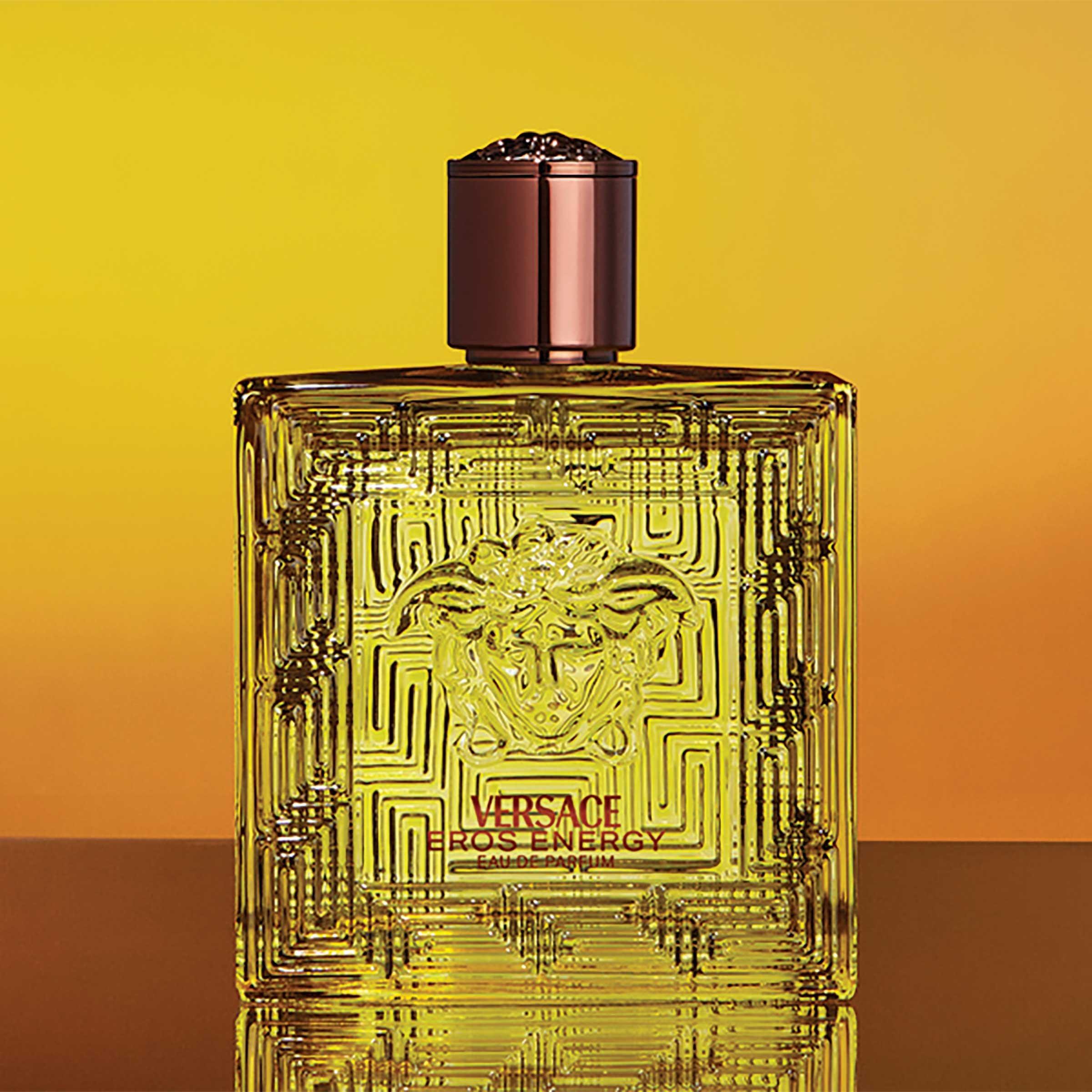 Versace Eros Energy Pour Homme in front of yellow background