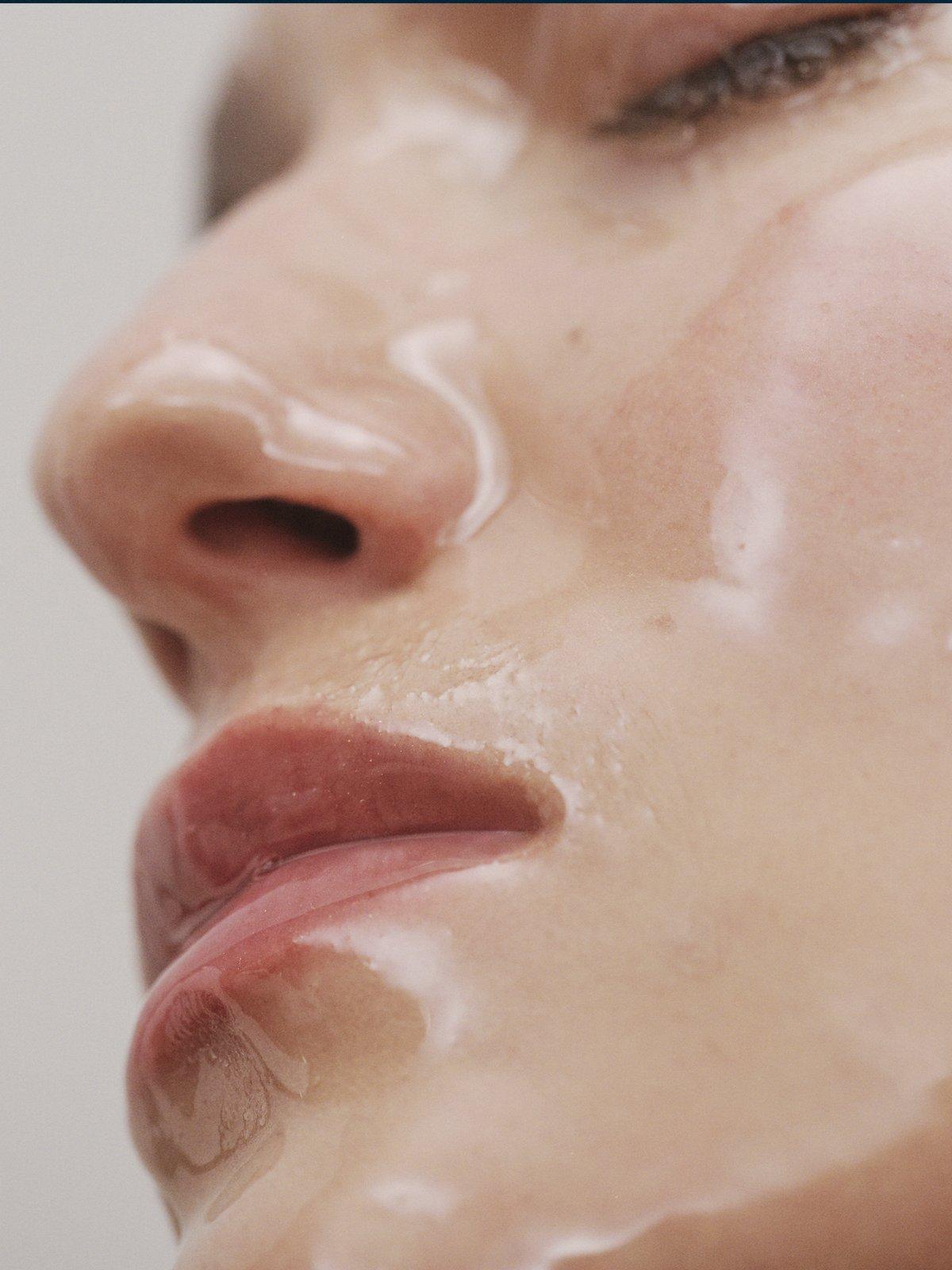 Image of a lady with water on her face