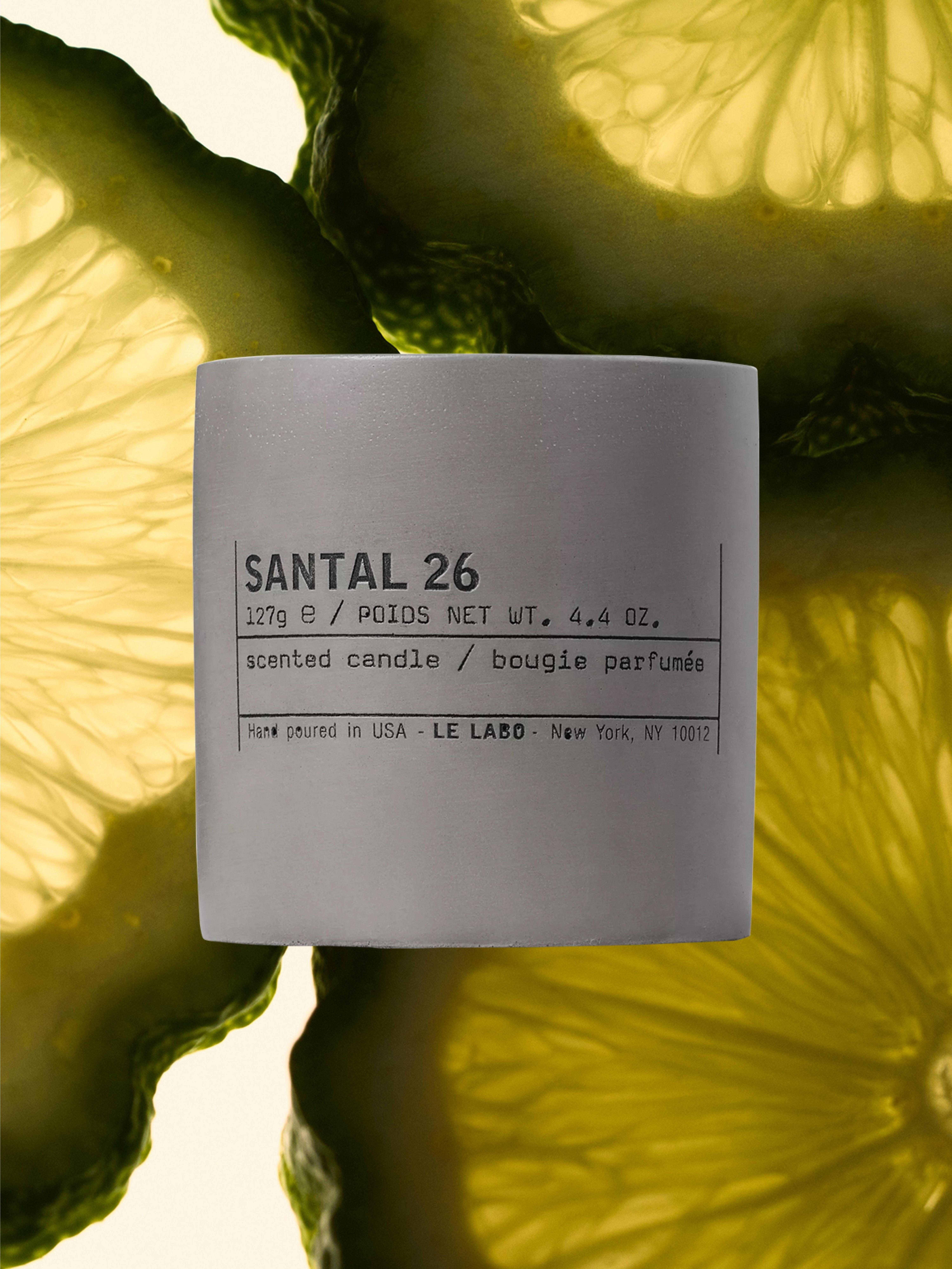 Image of Sandal candle on a lime bacjground