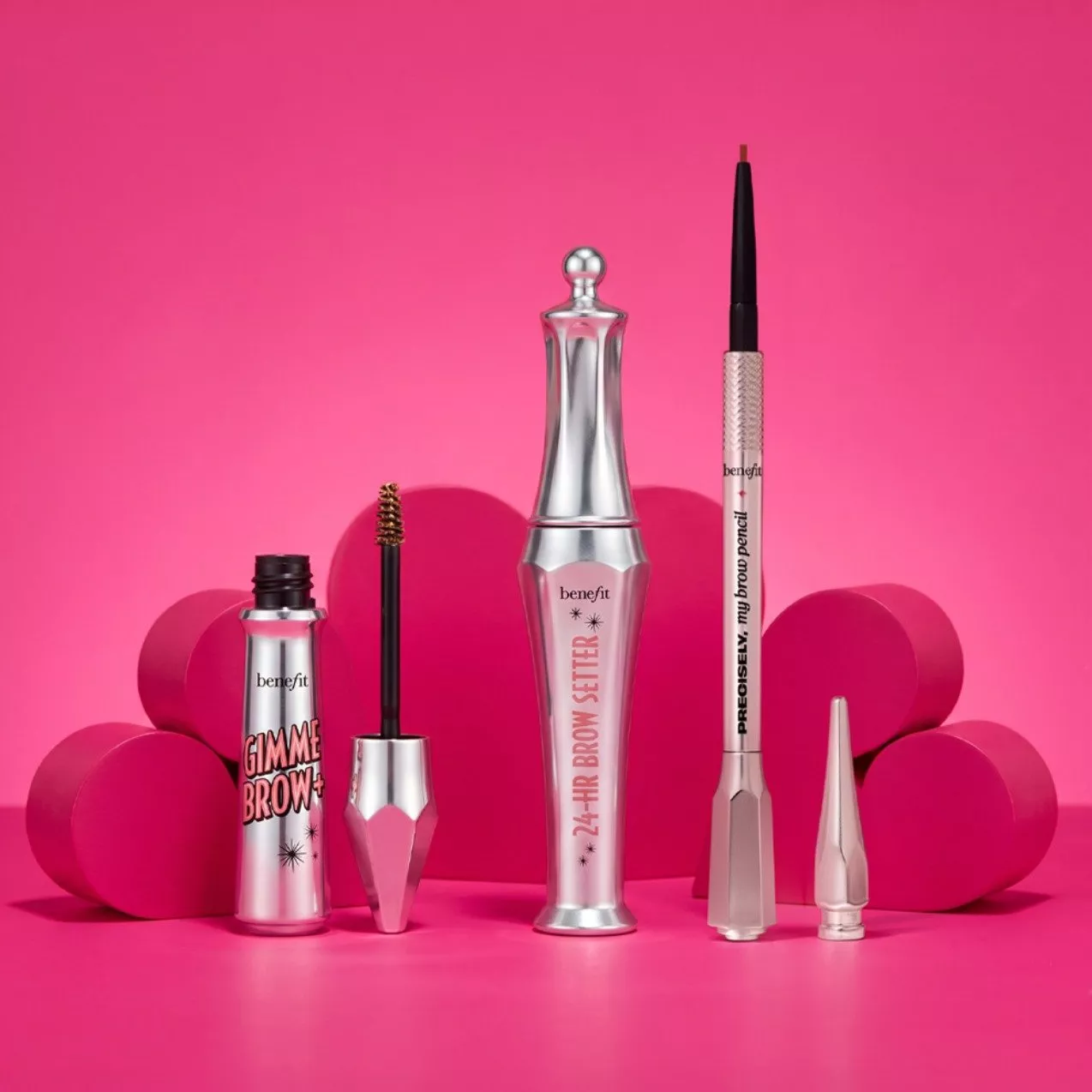 MAC Pro Brow Define pencil and Pro Locked Brow Gel with spoolie brush, arranged on a clean white background