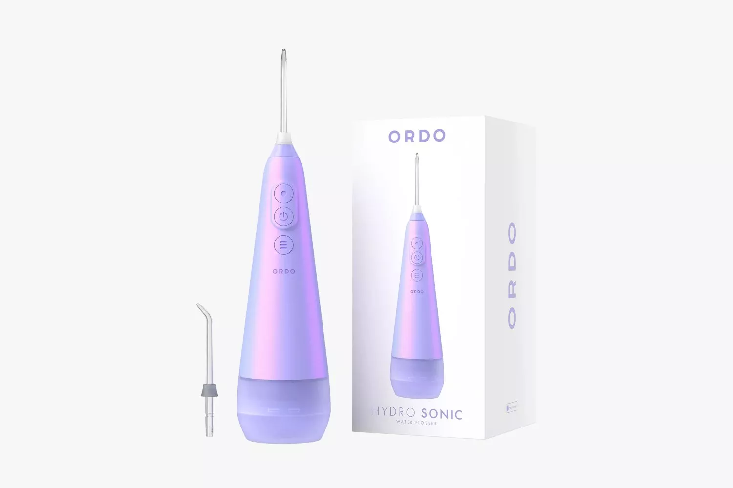 Purple Ordo Hydro Sonic water flosser with sleek design, shown with packaging box and additional nozzle.