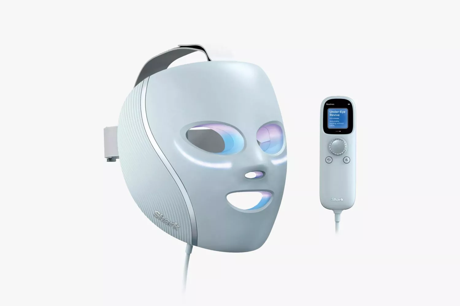 High-tech beauty device kit including a mask, remote control, eye pads, and branded pouch.