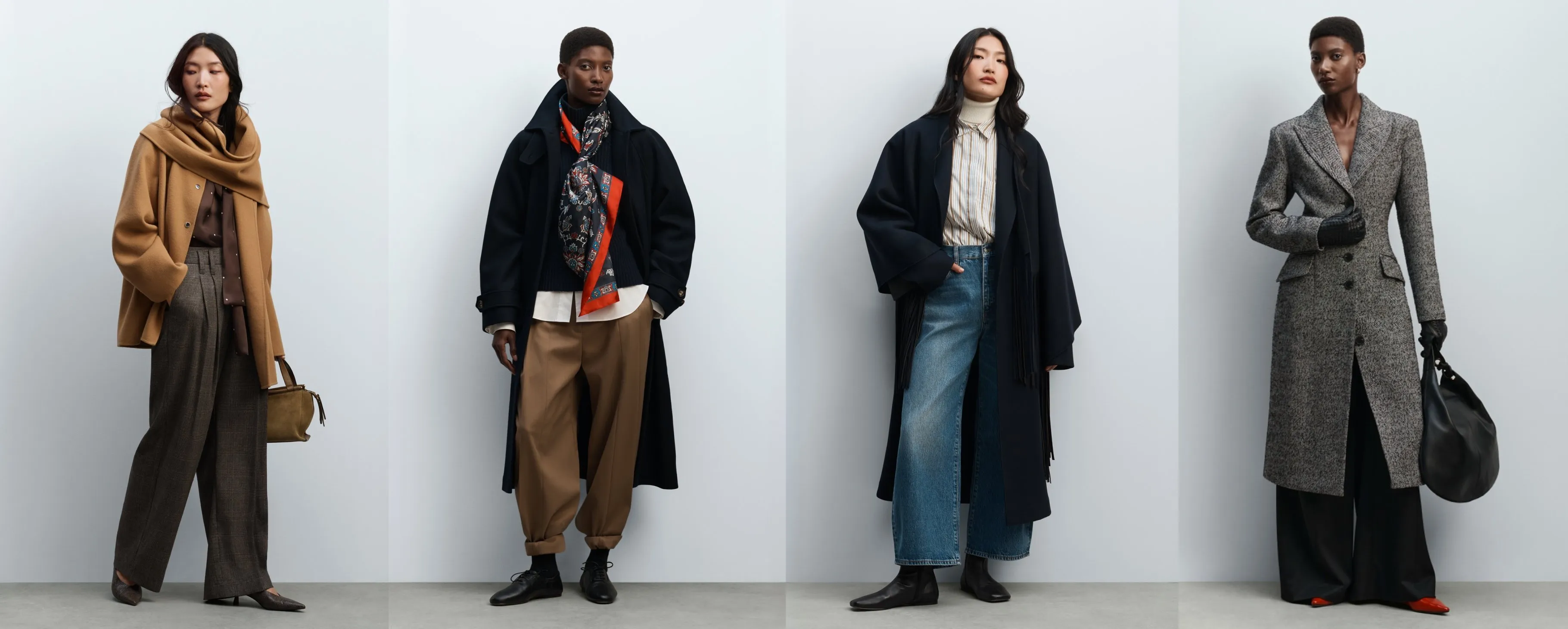 Four fashion models in chic autumn outfits, showcasing long coats, scarves, denim and tailoring on a studio backdrop