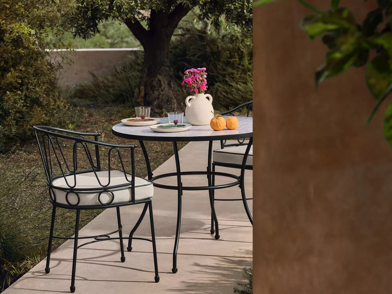 Solara Metal Garden Bistro Table & Chairs Set, in a garden setting